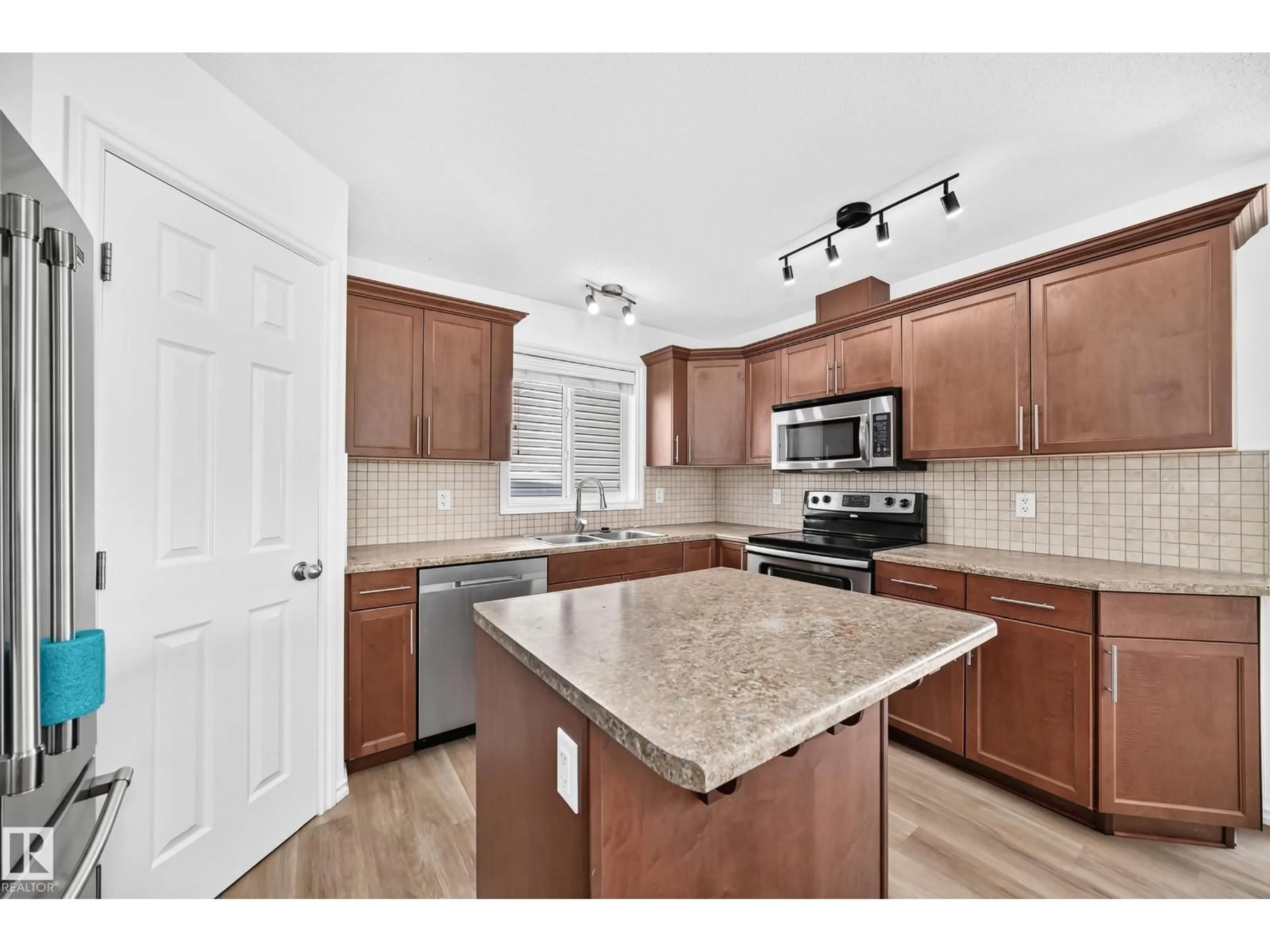Open concept kitchen, ceramic/tile floor for 369 BRINTNELL BV, Edmonton Alberta T5Y0G6