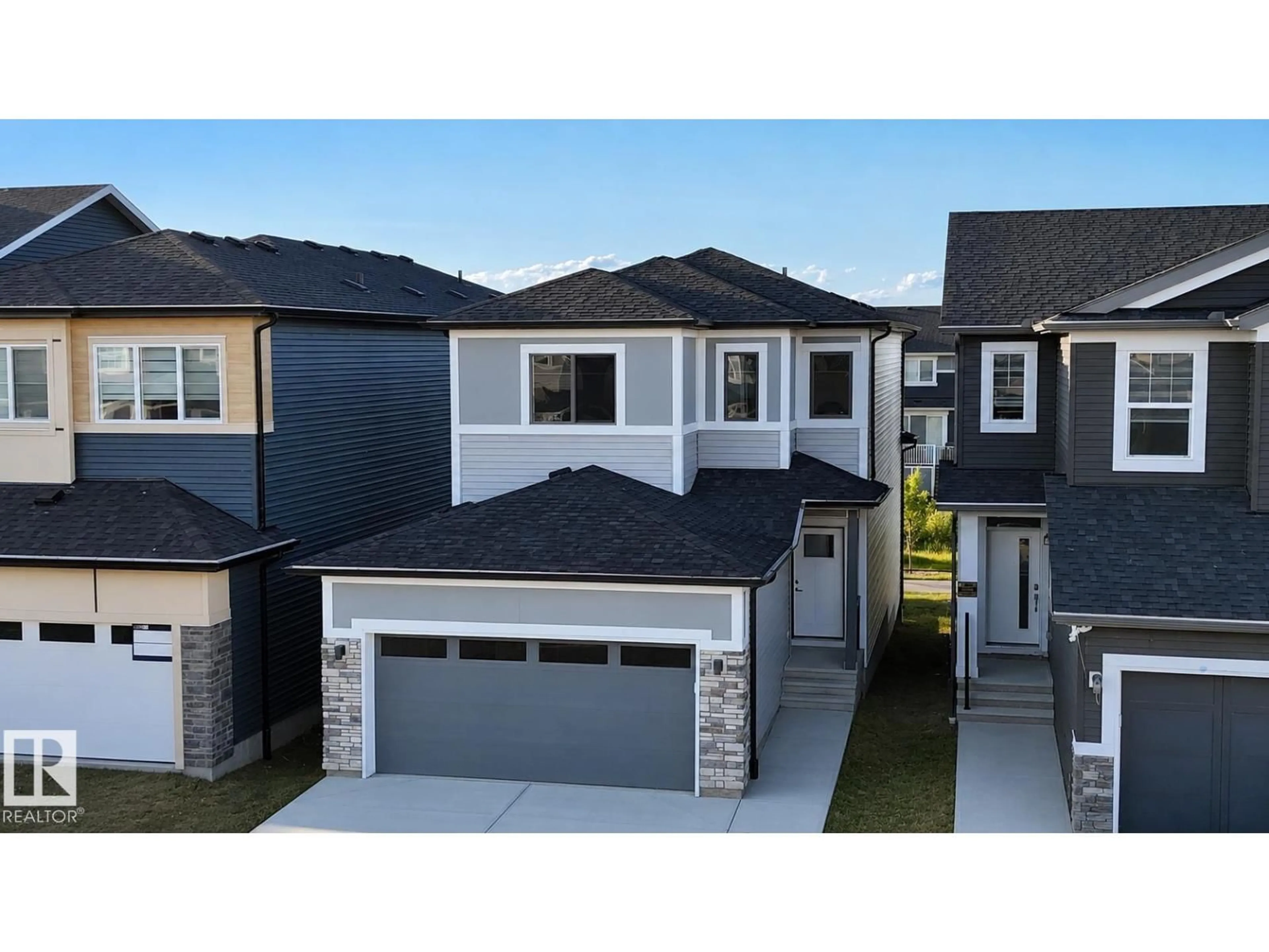 A pic from outside/outdoor area/front of a property/back of a property/a pic from drone, street for 7122 52 AVE, Beaumont Alberta T4X2Z8