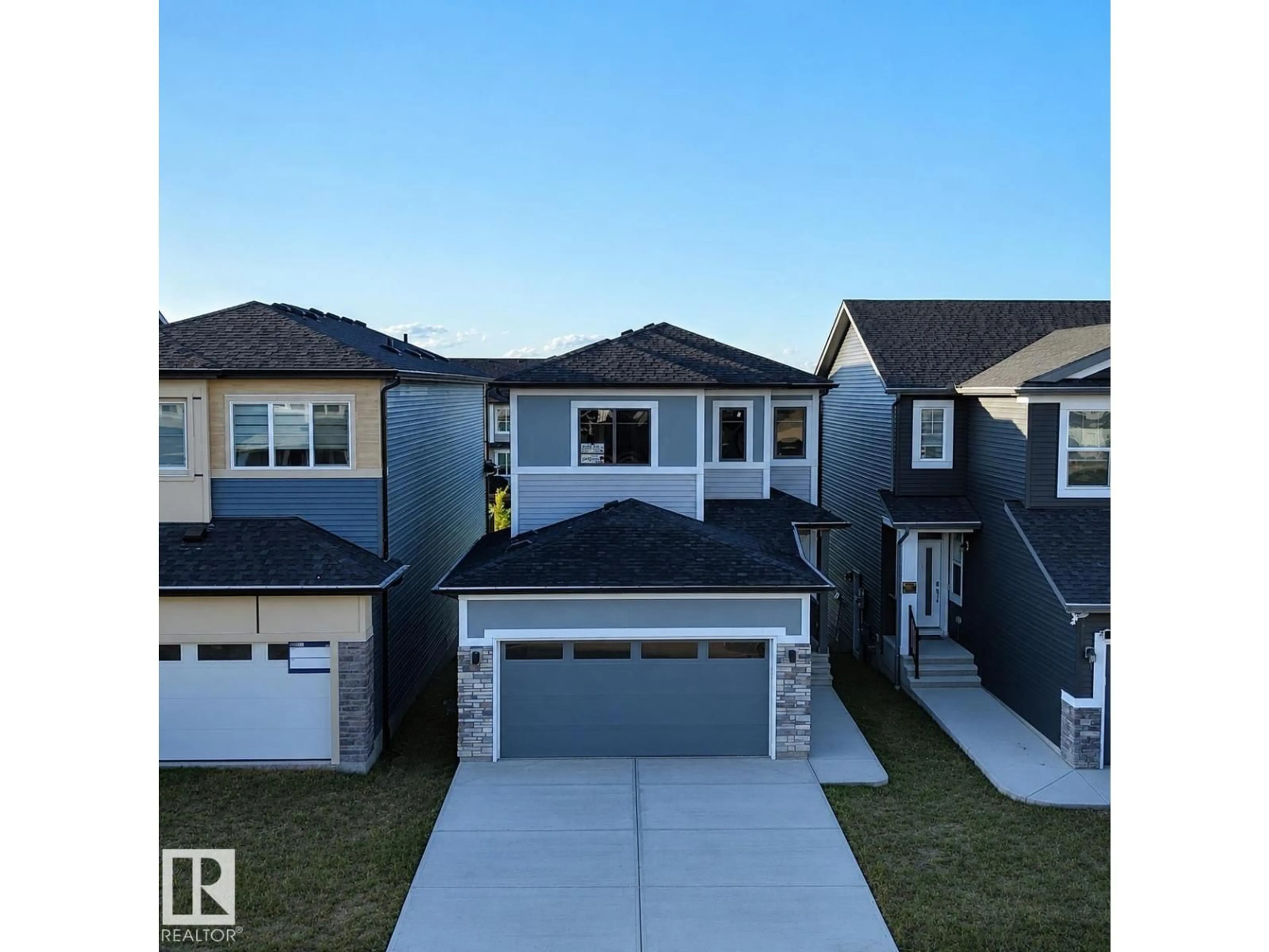 A pic from outside/outdoor area/front of a property/back of a property/a pic from drone, street for 7122 52 AVE, Beaumont Alberta T4X2Z8