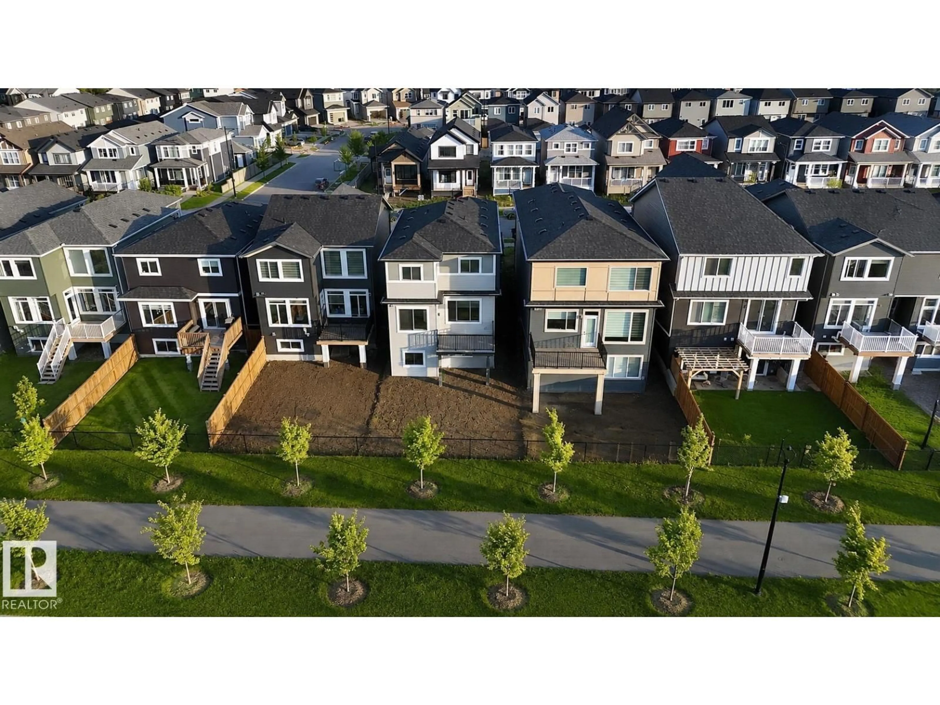 A pic from outside/outdoor area/front of a property/back of a property/a pic from drone, street for 7122 52 AVE, Beaumont Alberta T4X2Z8