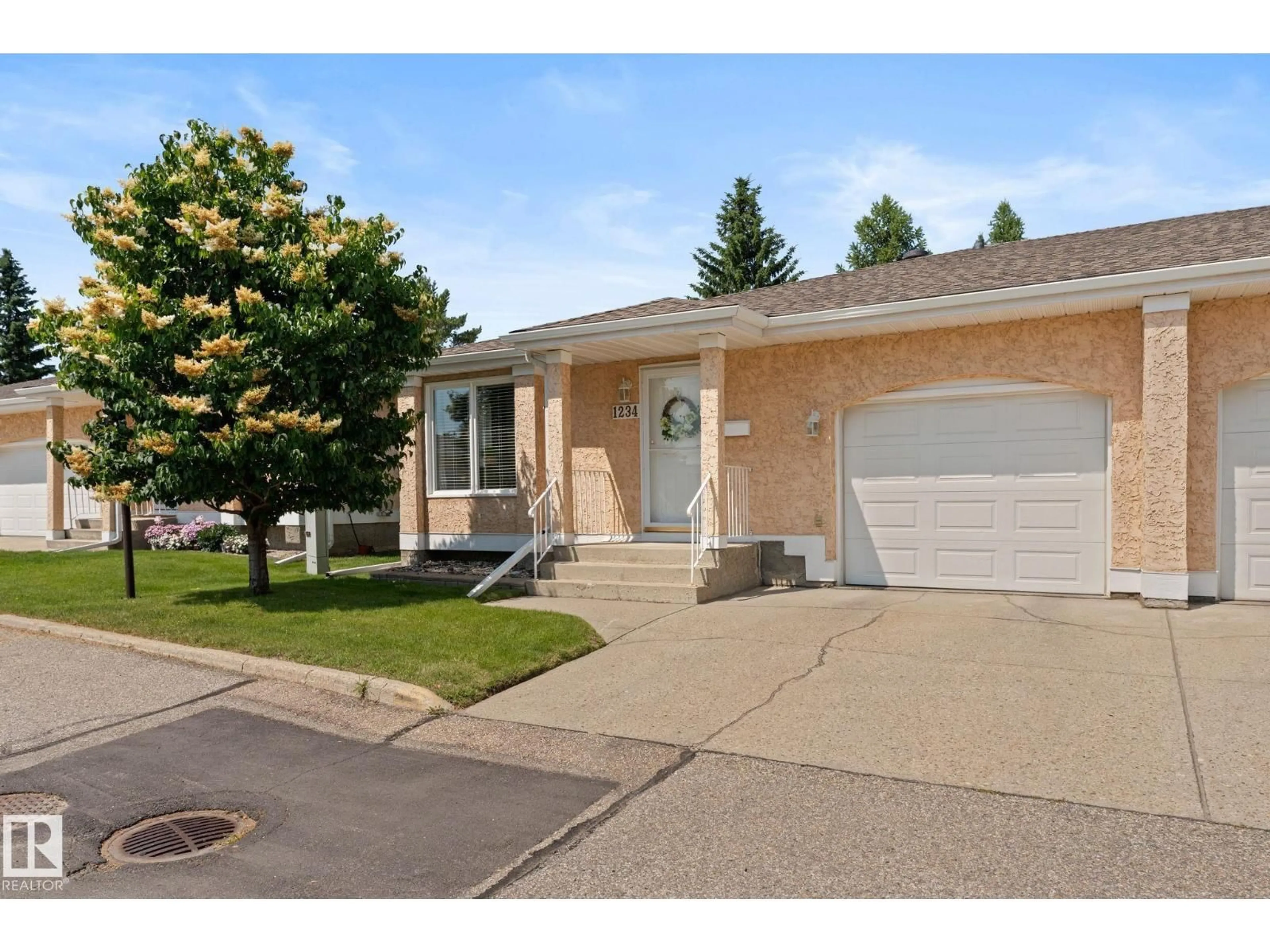 Home with brick exterior material, street for NW - 1234 105 ST, Edmonton Alberta T6J6J9