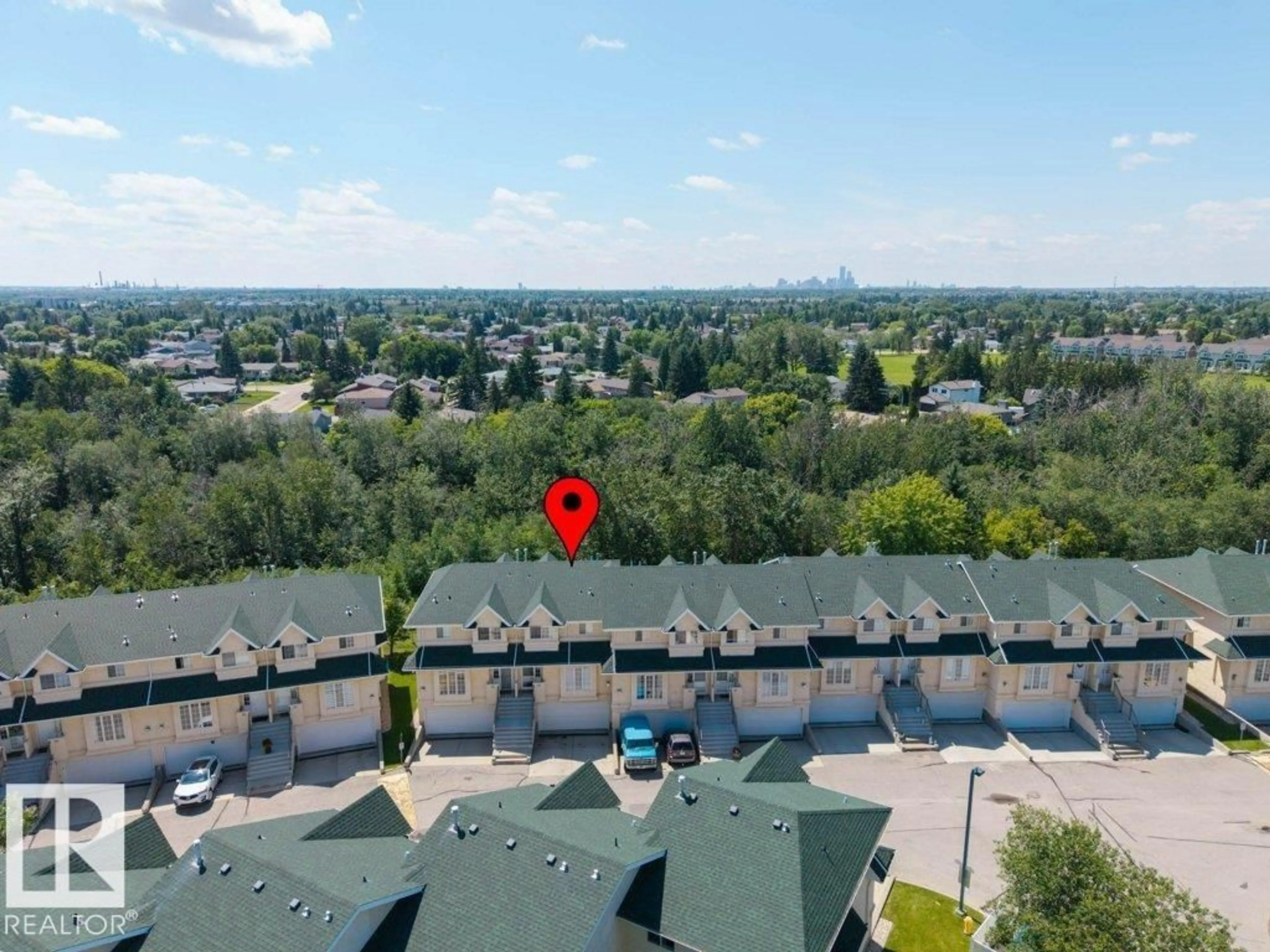 A pic from outside/outdoor area/front of a property/back of a property/a pic from drone, city buildings view from balcony for #39 - 2419 133 AV, Edmonton Alberta T5A5A5