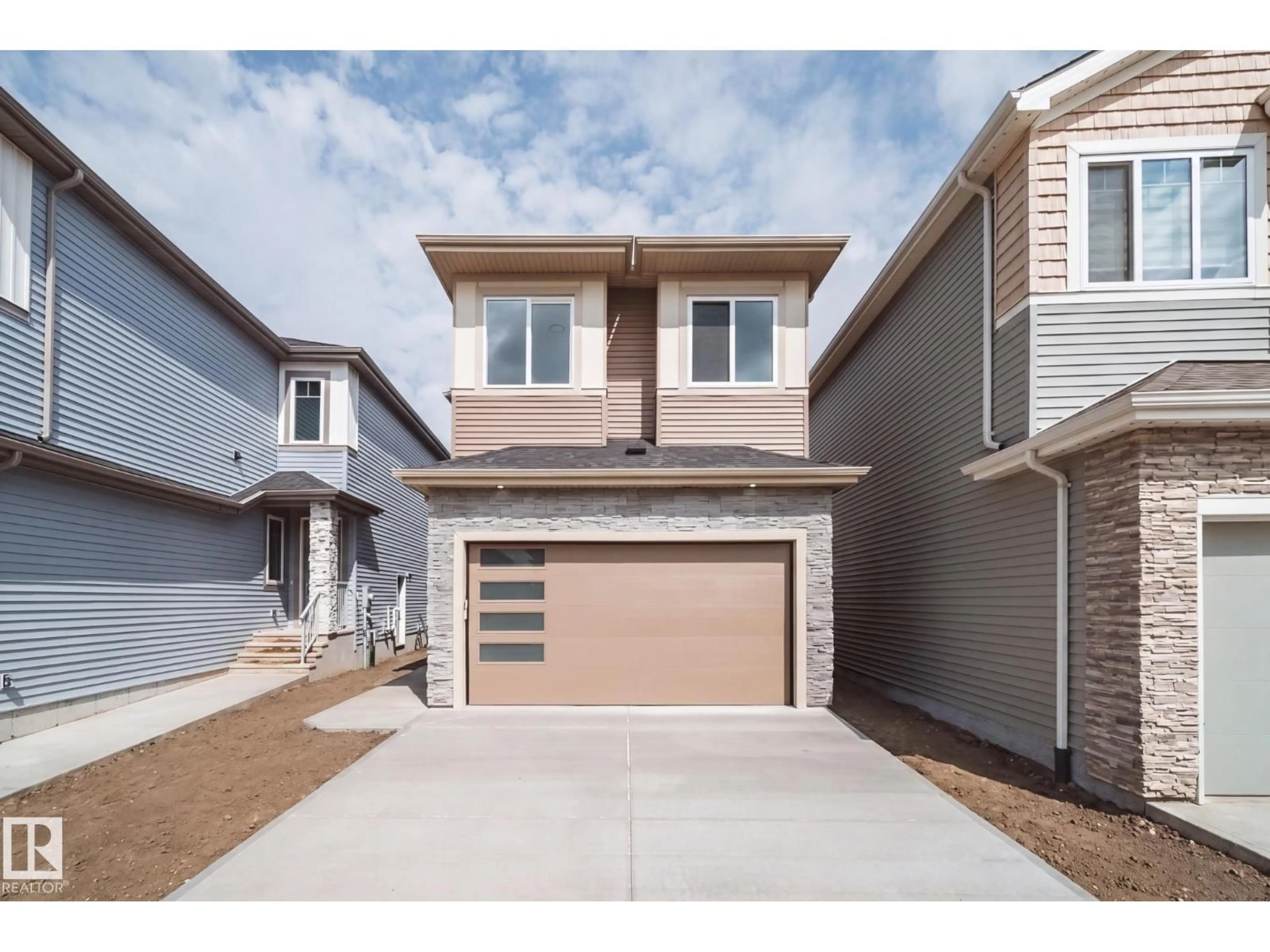 Home with vinyl exterior material, street for 8816 183 AV, Edmonton Alberta T5Z0S8