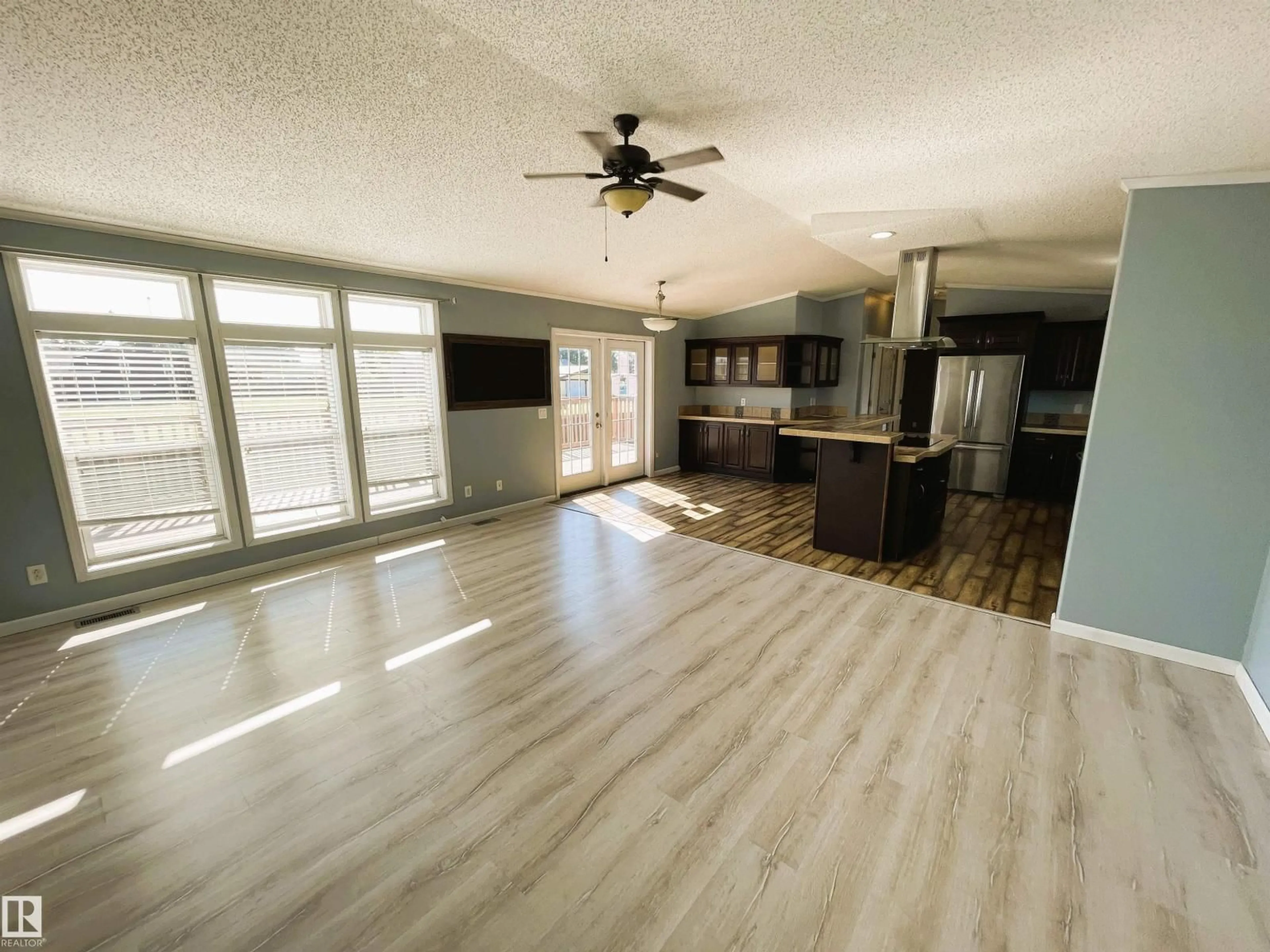 Open concept kitchen, wood/laminate floor for 5102 51 AV, Fort Kent Alberta T0A1H0