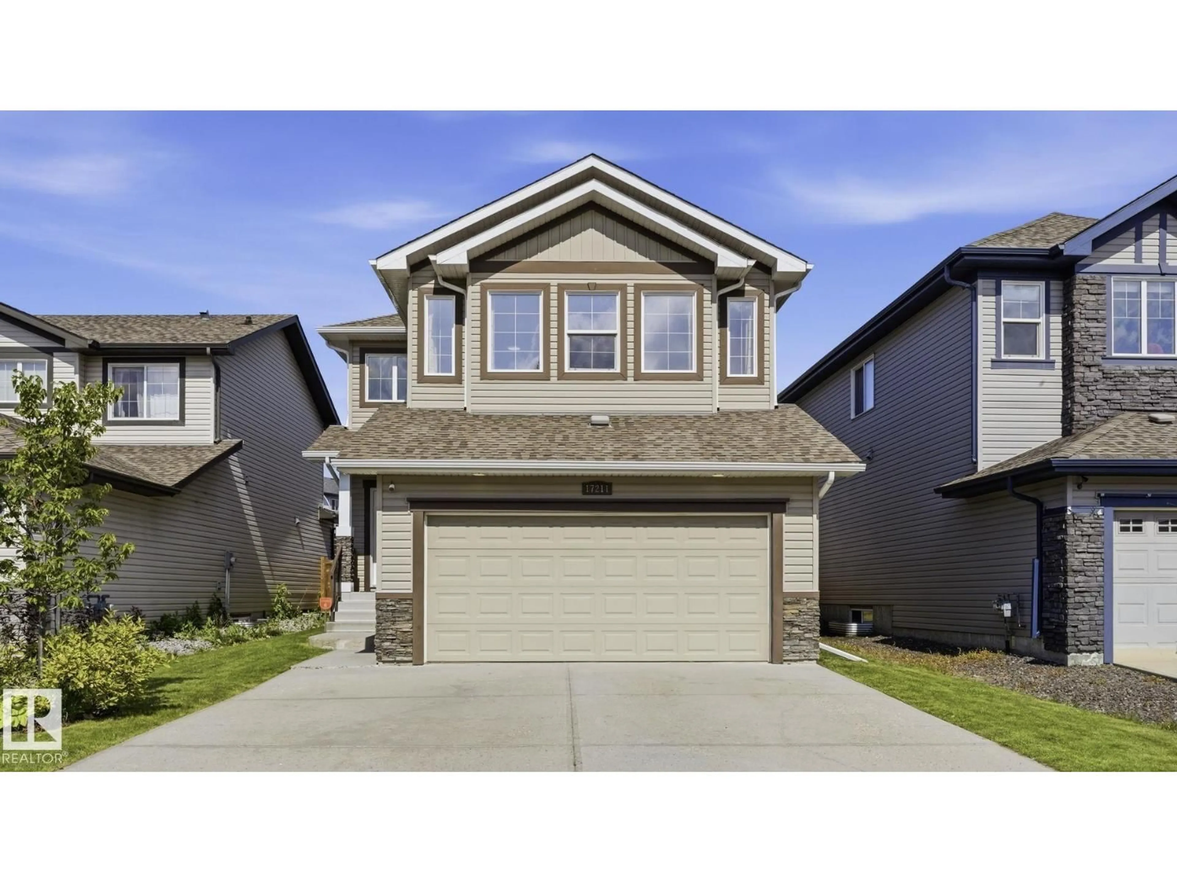 Home with vinyl exterior material, street for NW - 17211 78 ST, Edmonton Alberta T5Z0H6