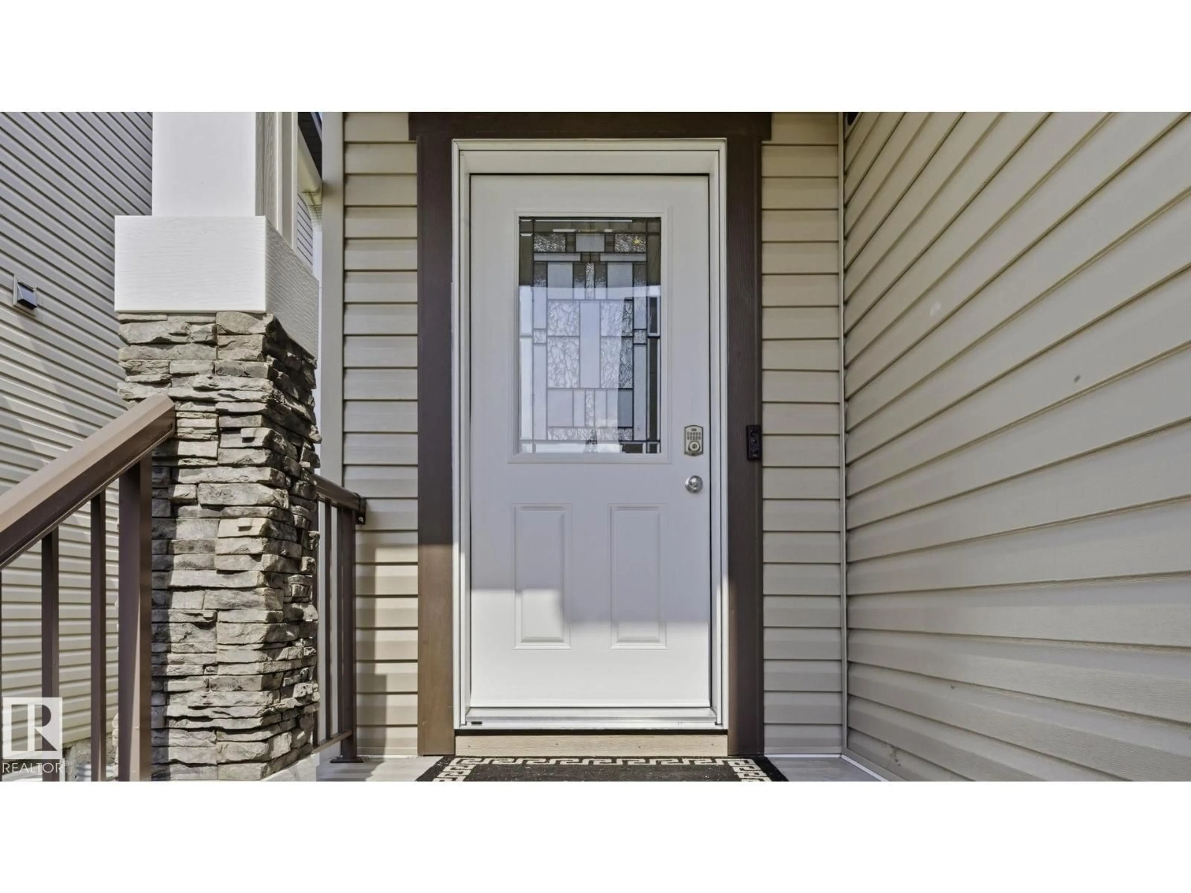 Home with vinyl exterior material, street for NW - 17211 78 ST, Edmonton Alberta T5Z0H6