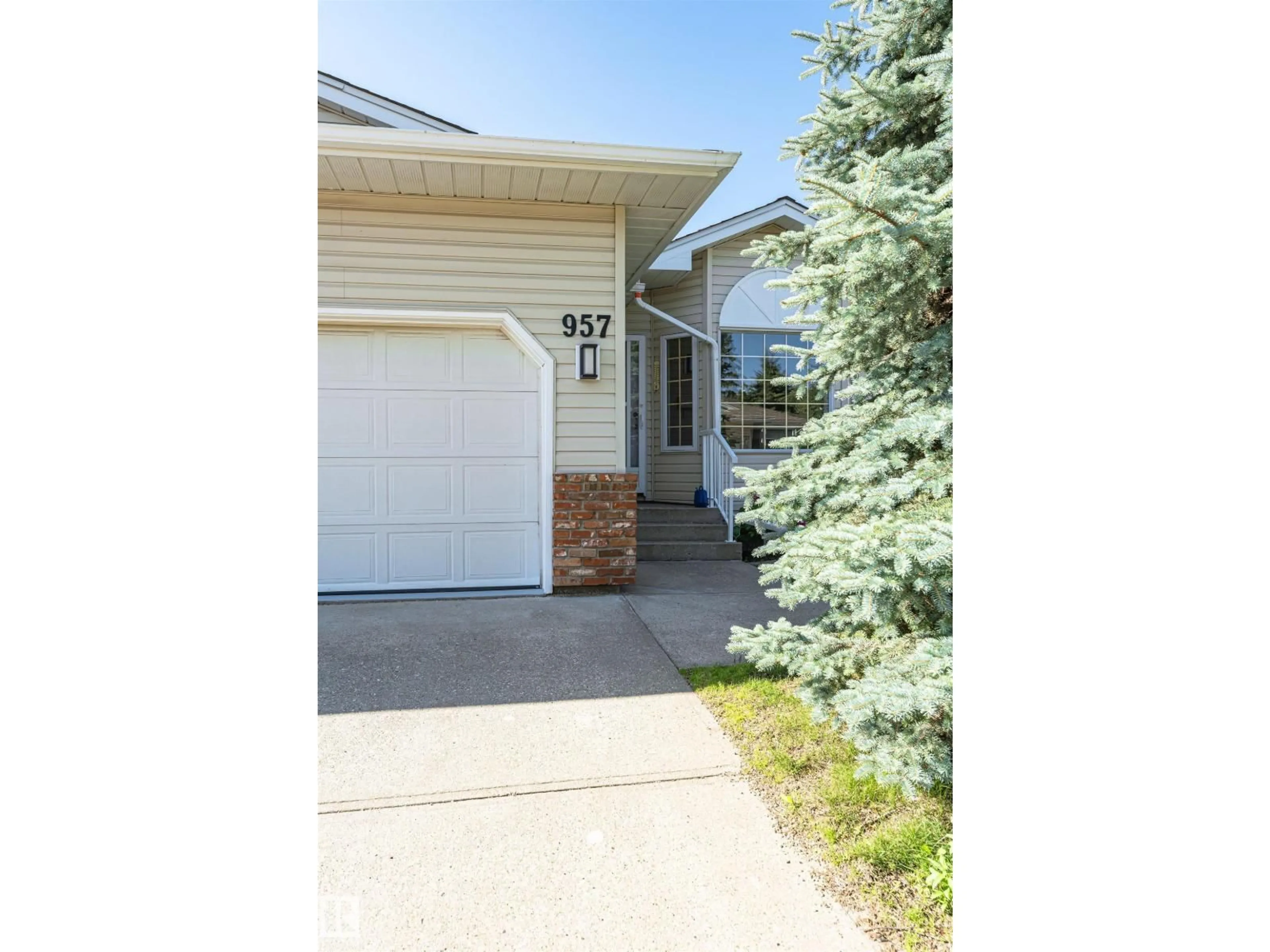 Home with vinyl exterior material, street for 957 YOUVILLE DR, Edmonton Alberta T6L6T2