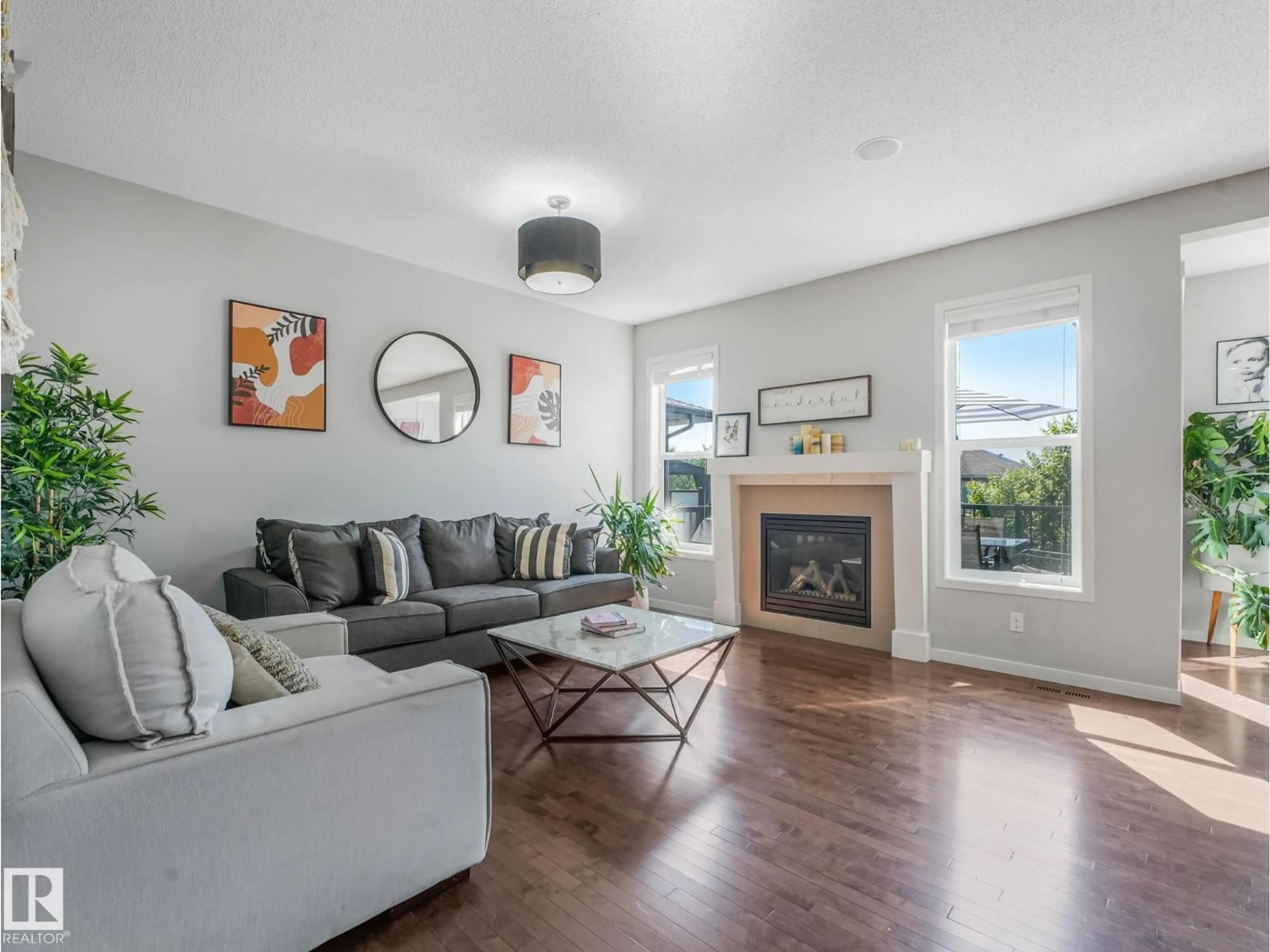 Living room with furniture, unknown for 908 GOSHAWK PT, Edmonton Alberta T5S0H6