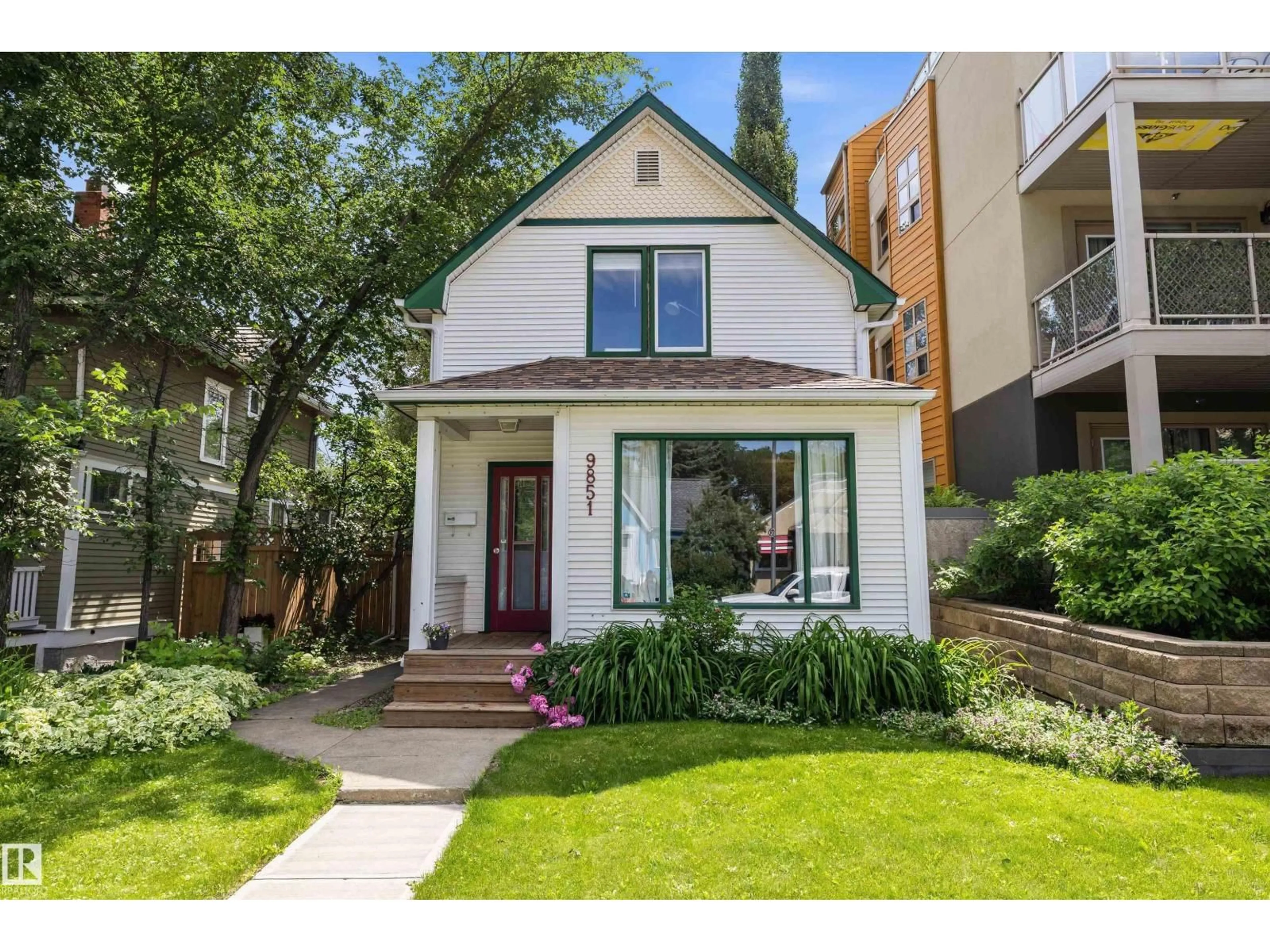 Home with brick exterior material, street for NW - 9851 86 AV, Edmonton Alberta T6E2L5