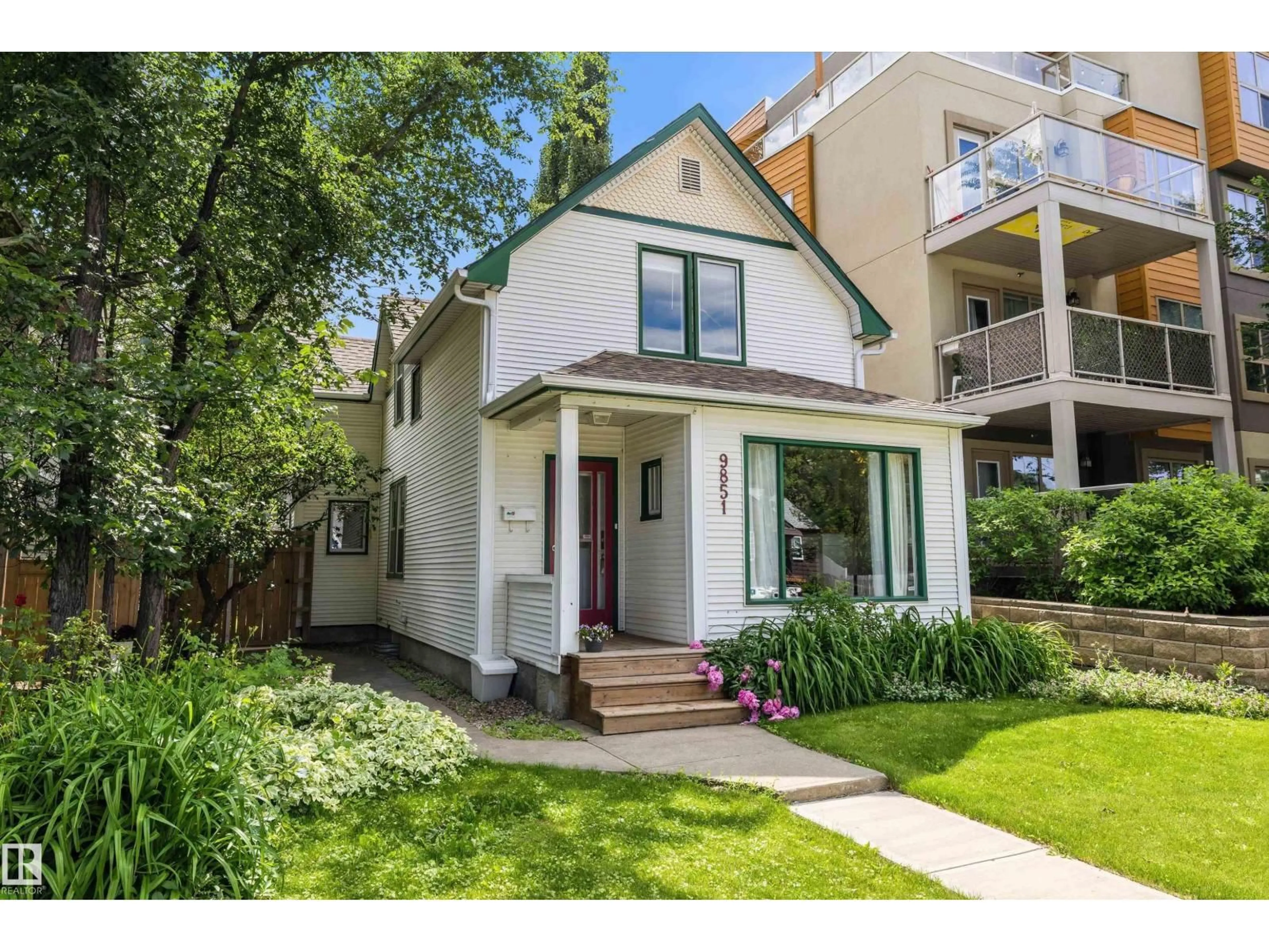 Home with brick exterior material, street for NW - 9851 86 AV, Edmonton Alberta T6E2L5