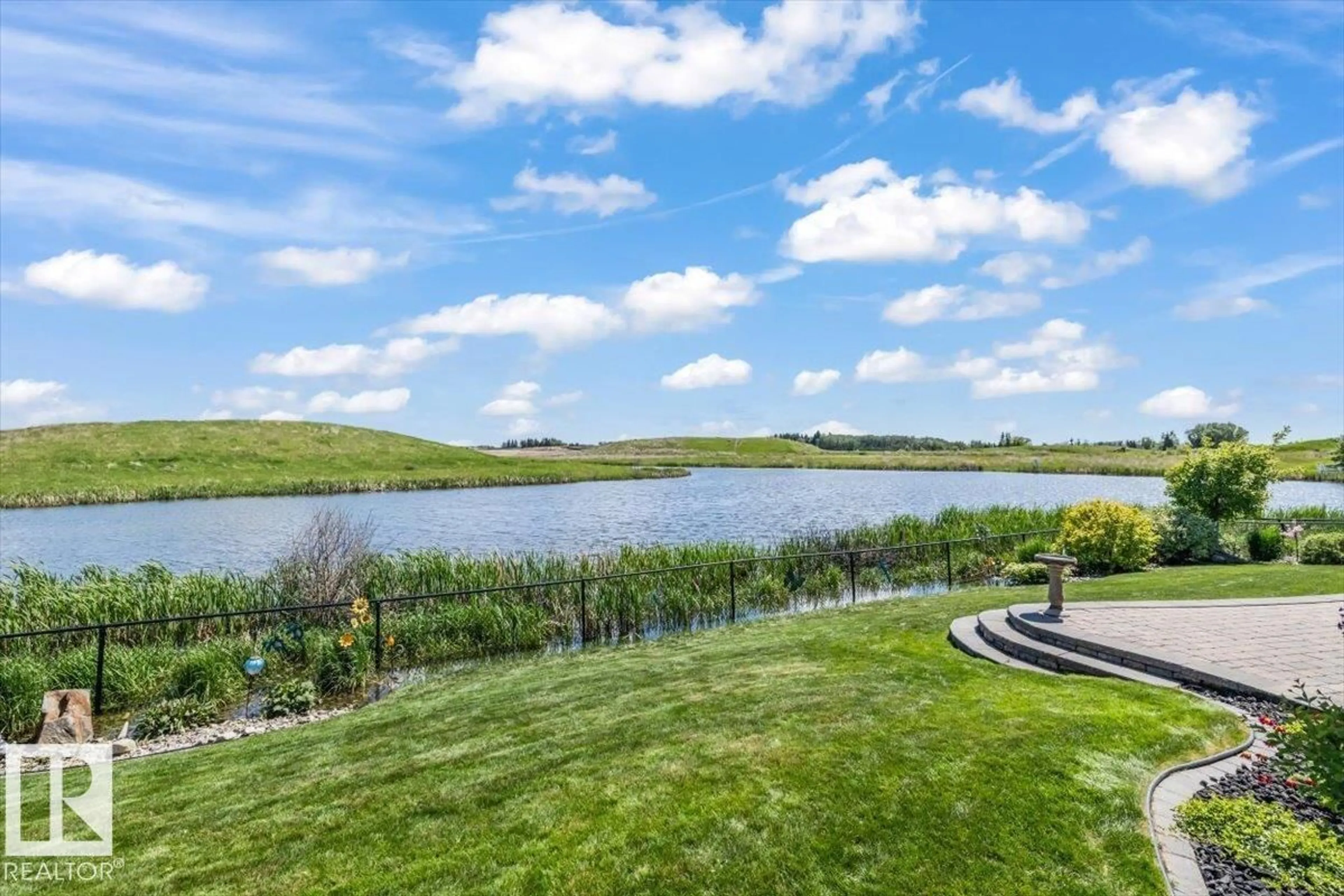 A pic from outside/outdoor area/front of a property/back of a property/a pic from drone, water/lake/river/ocean view for 87 LAKELAND CR, Beaumont Alberta T4X0B5