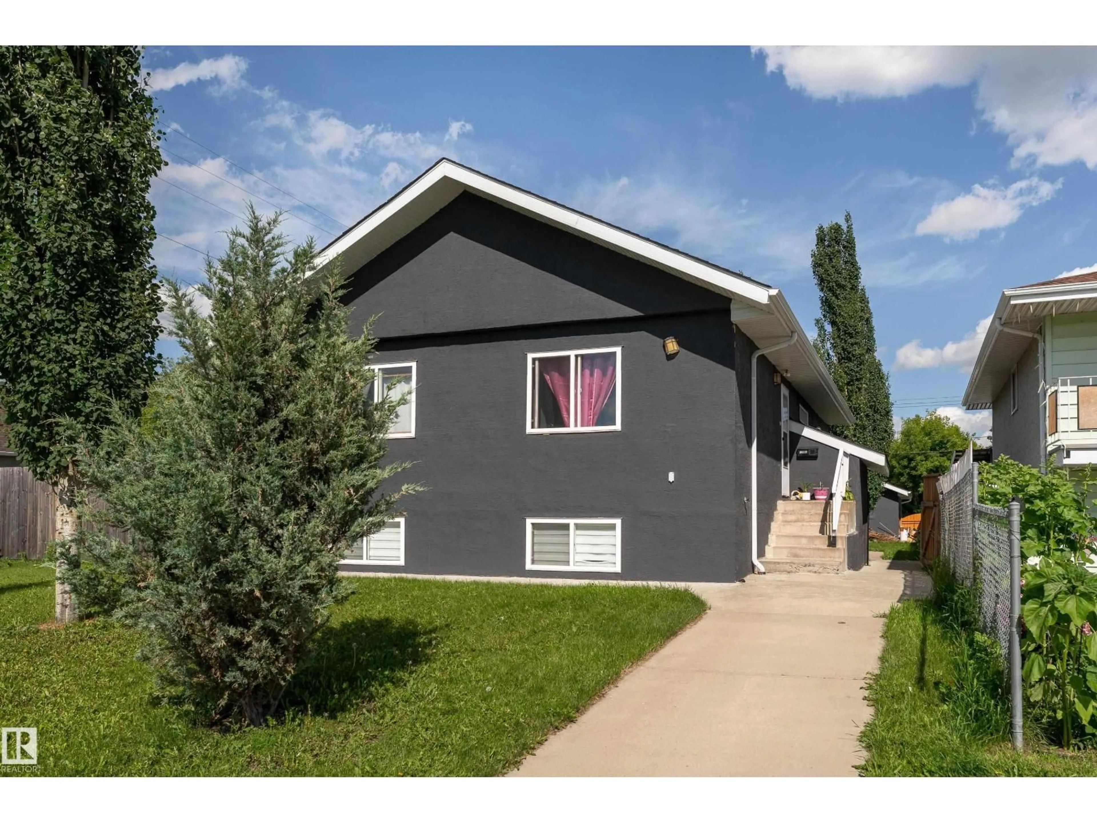 Home with vinyl exterior material, street for NW - 12847 86 ST, Edmonton Alberta T5E3A9