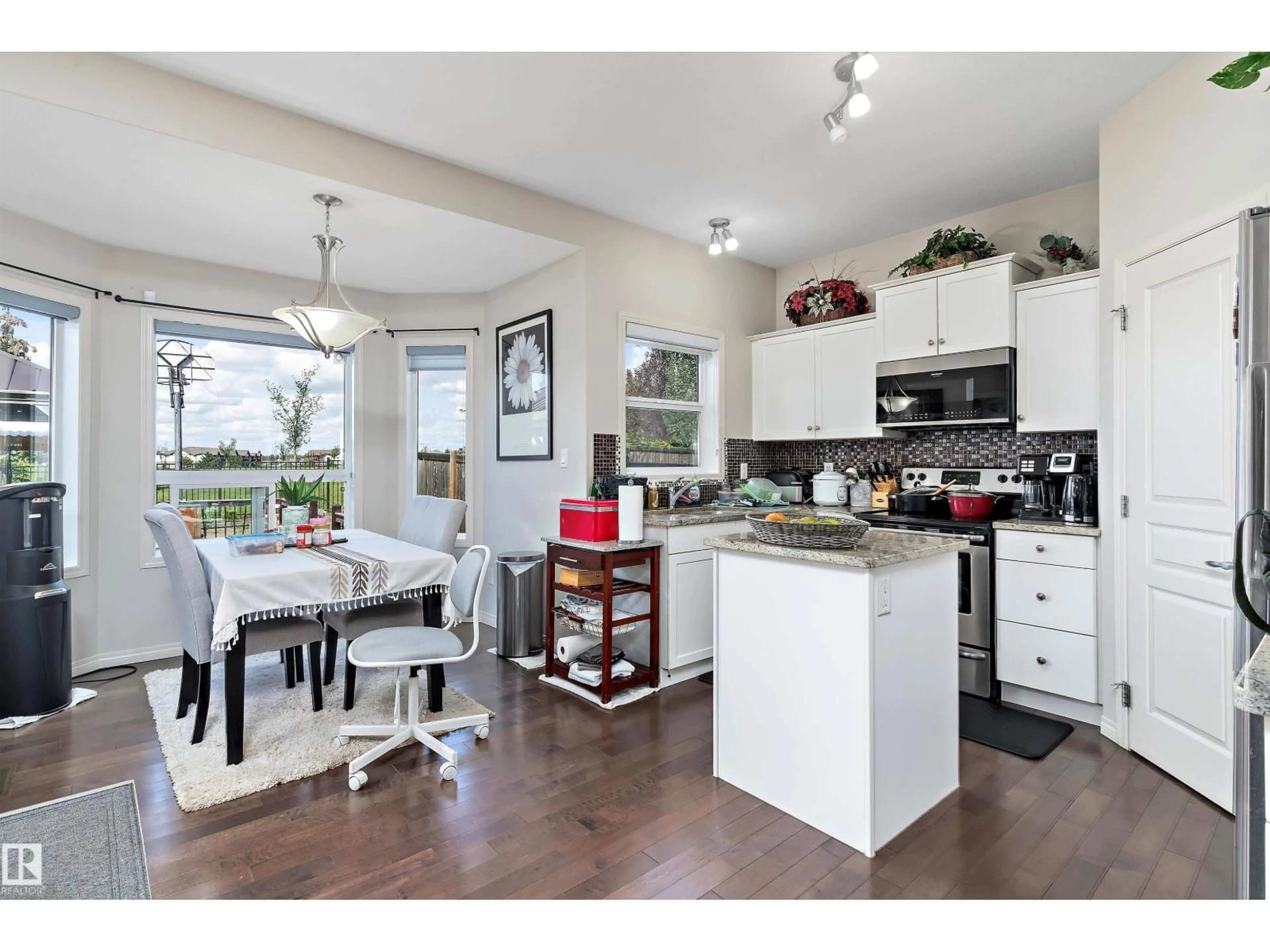 Open concept kitchen, unknown for SW - 6934 19A AV, Edmonton Alberta T6X0M1