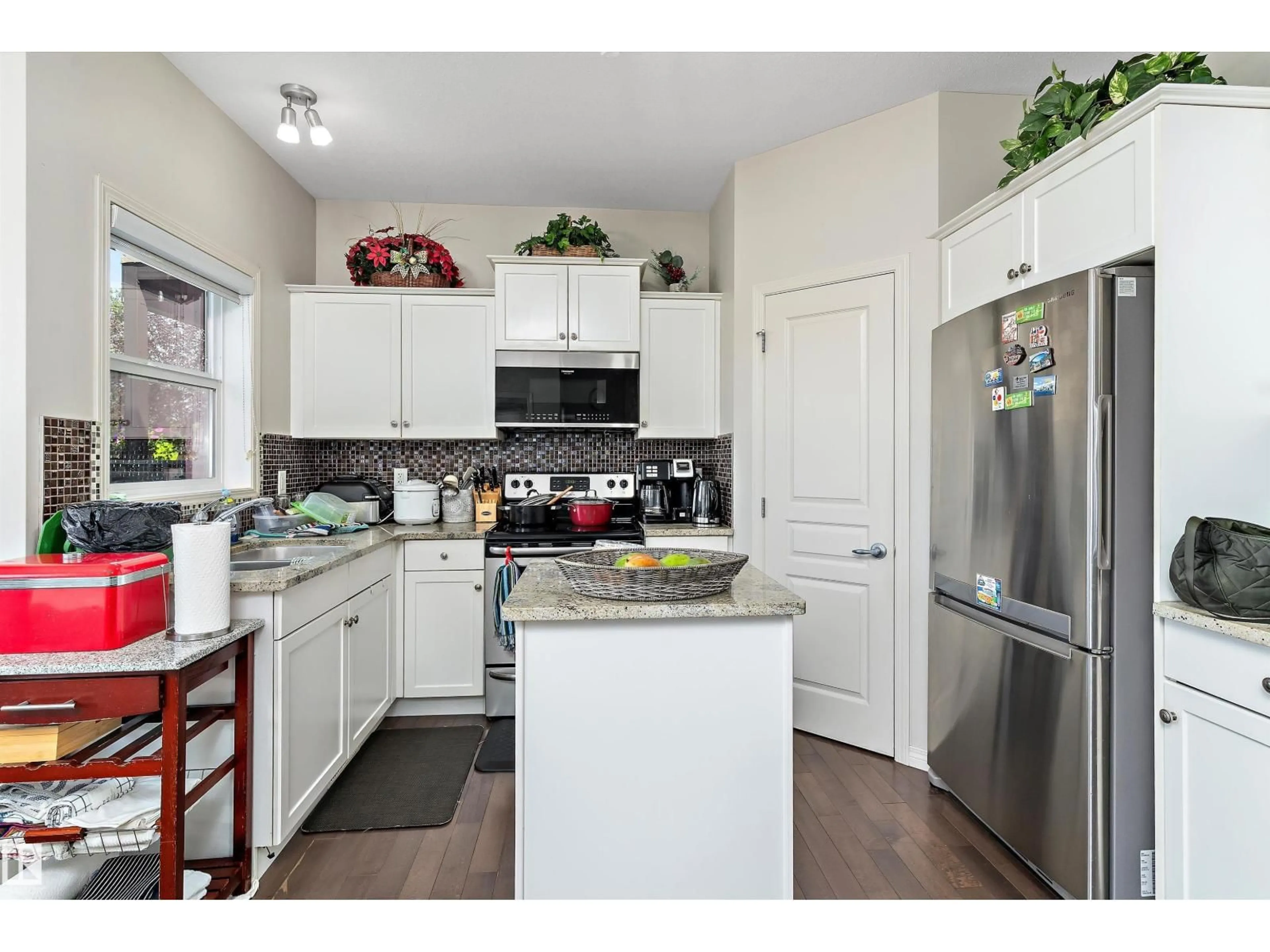 Open concept kitchen, unknown for SW - 6934 19A AV, Edmonton Alberta T6X0M1