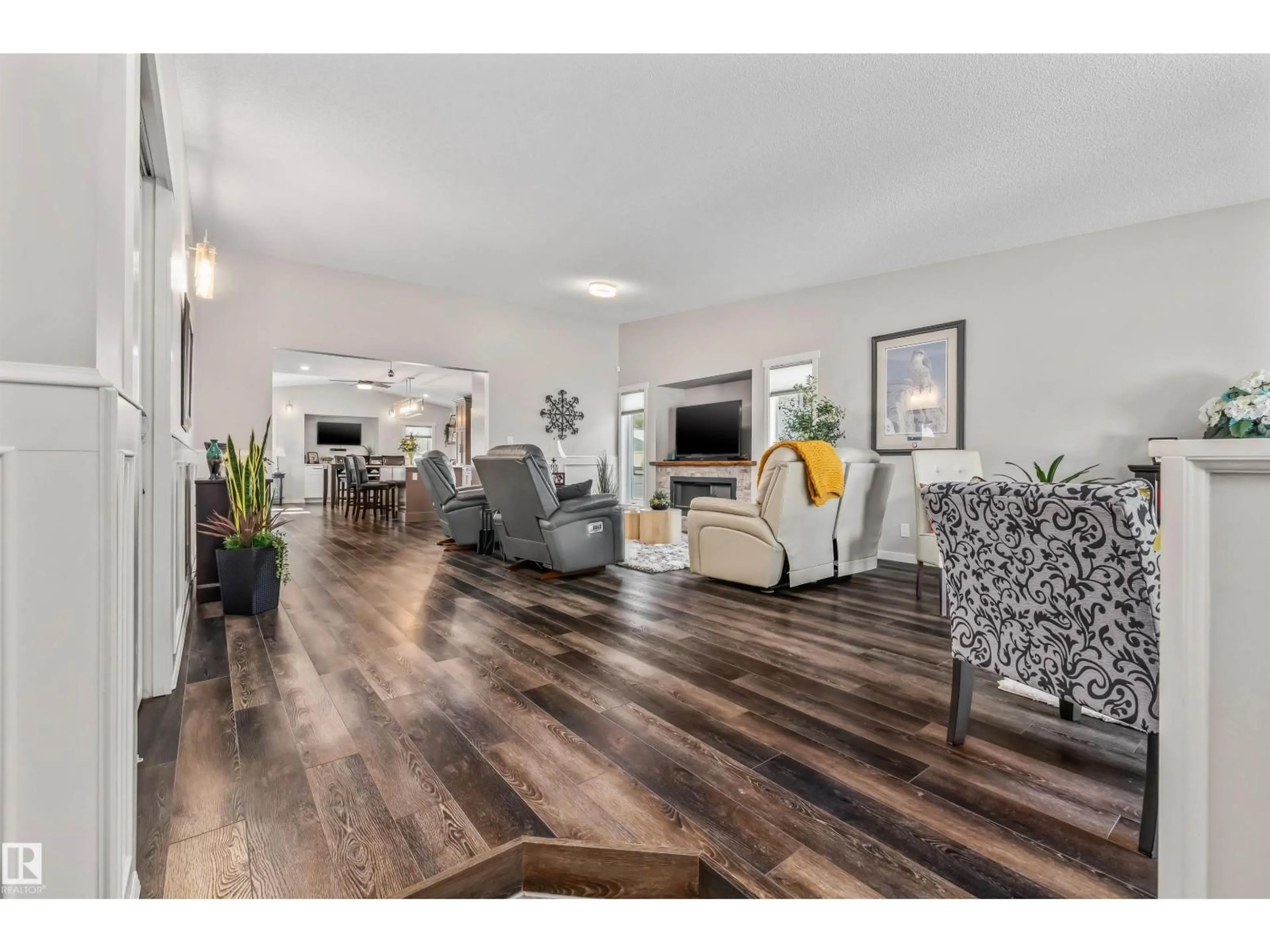 Living room with furniture, wood/laminate floor for 7 WILLIAM BELL DR, Leduc Alberta T9E6H7