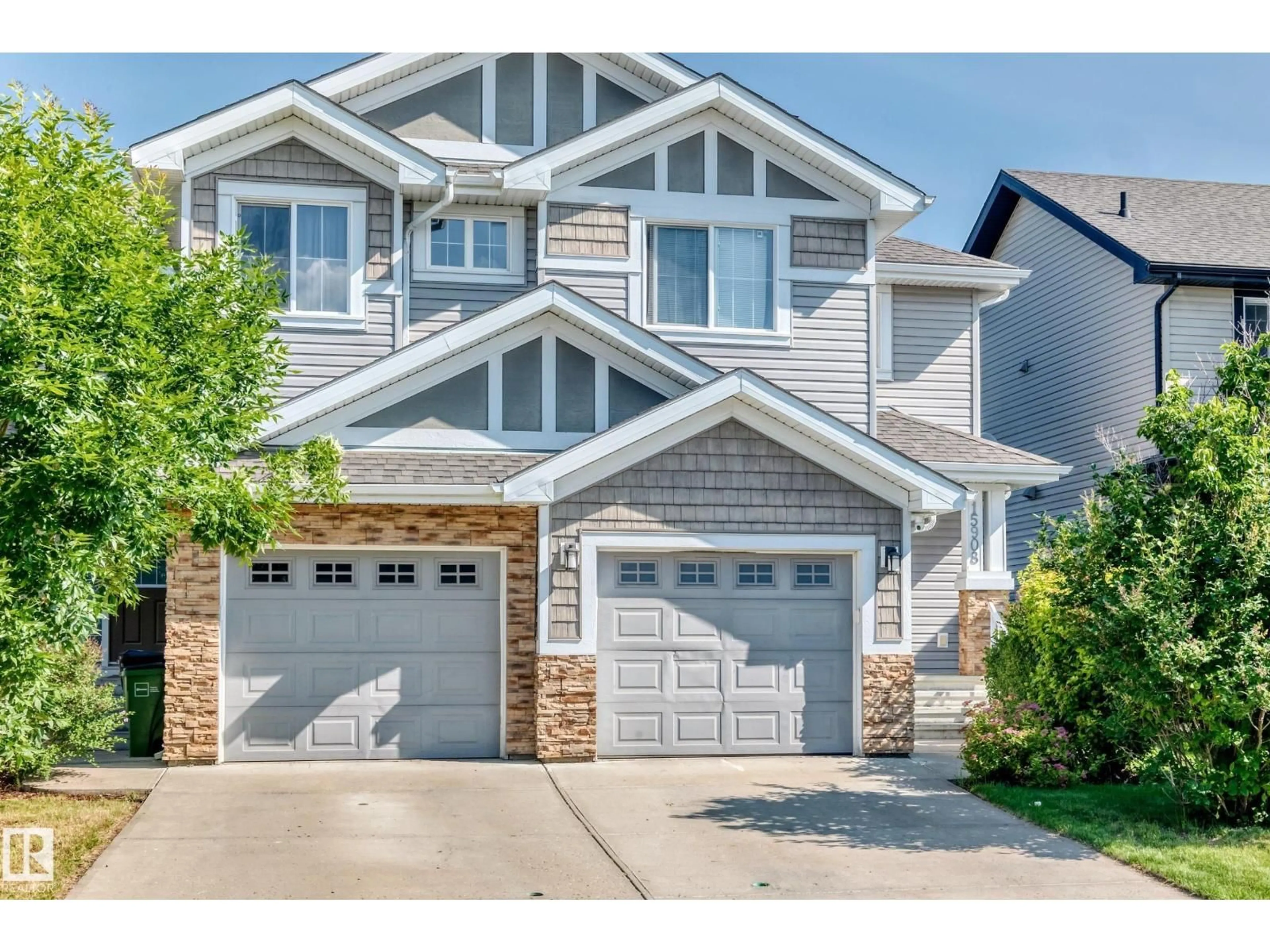 Home with vinyl exterior material, street for 15908 10 AV, Edmonton Alberta T6W2H2