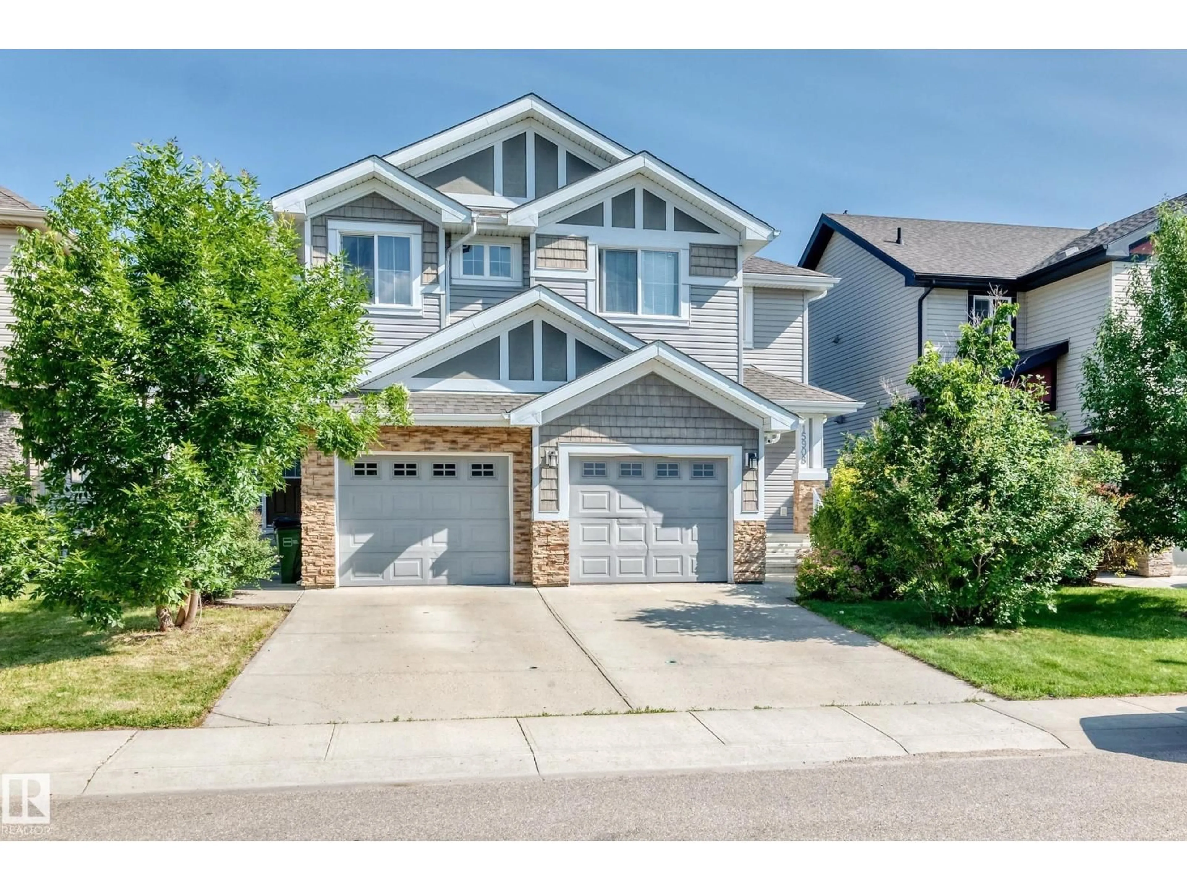 Home with vinyl exterior material, street for 15908 10 AV, Edmonton Alberta T6W2H2