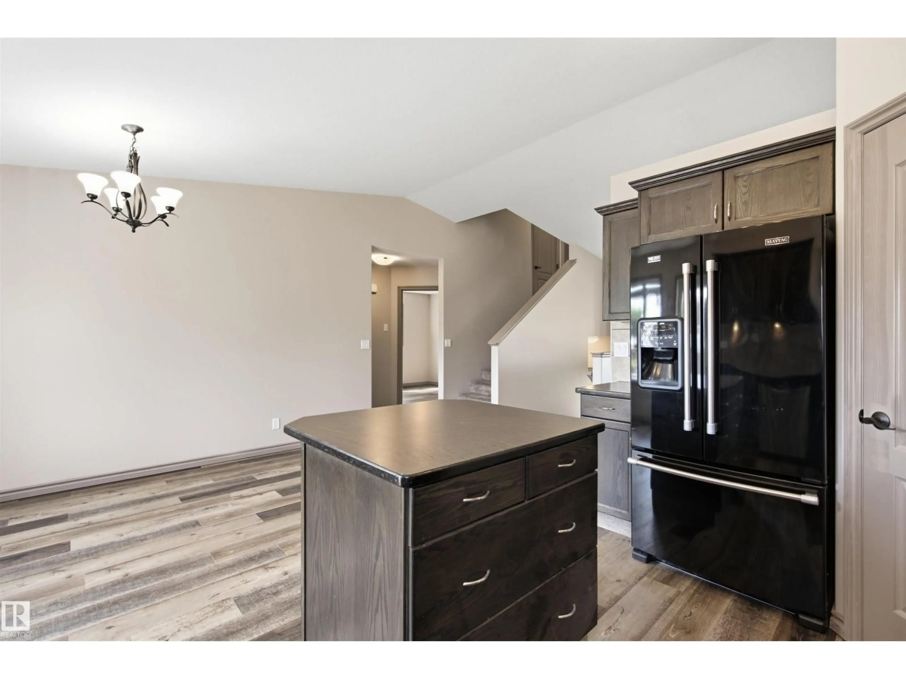 Open concept kitchen, wood/laminate floor for 3814 45 AV, Bonnyville Town Alberta T9N0A8