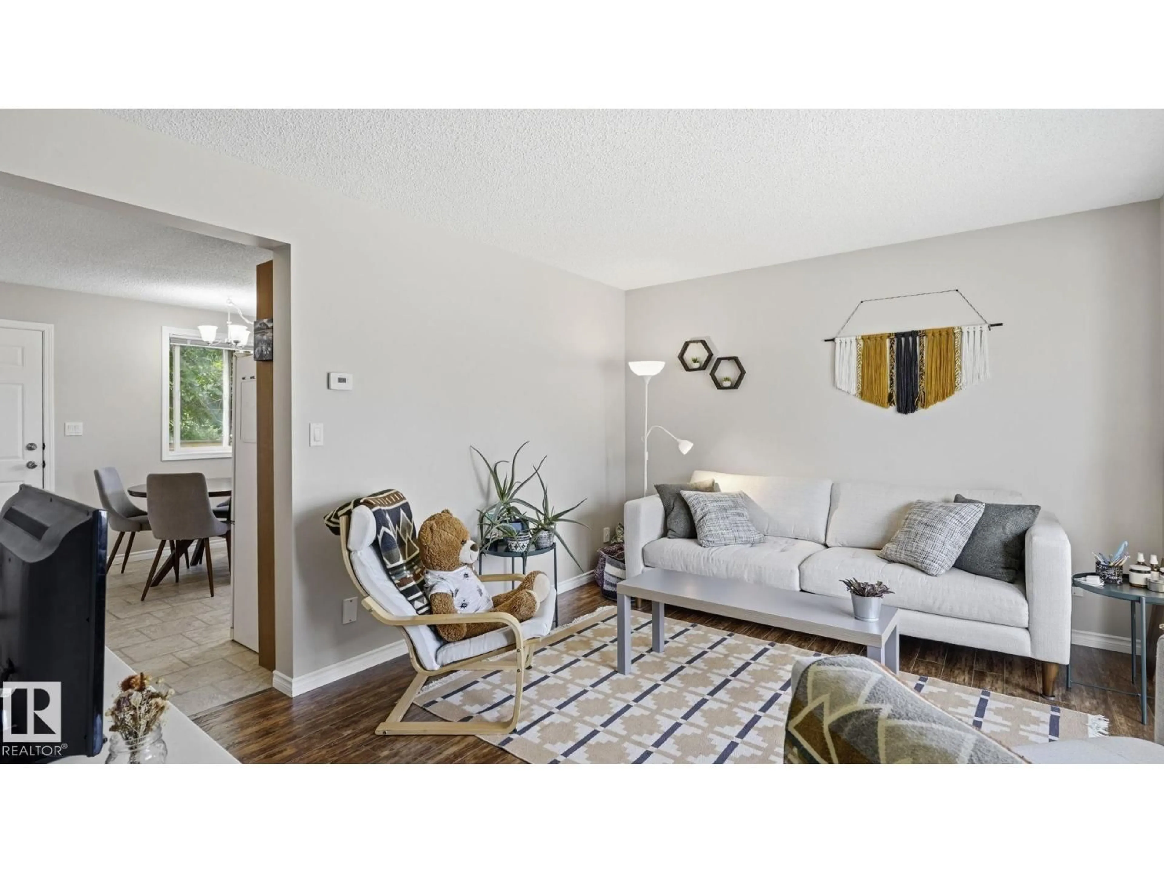 Living room with furniture, unknown for 8230 71 ST, Edmonton Alberta T6B1X2