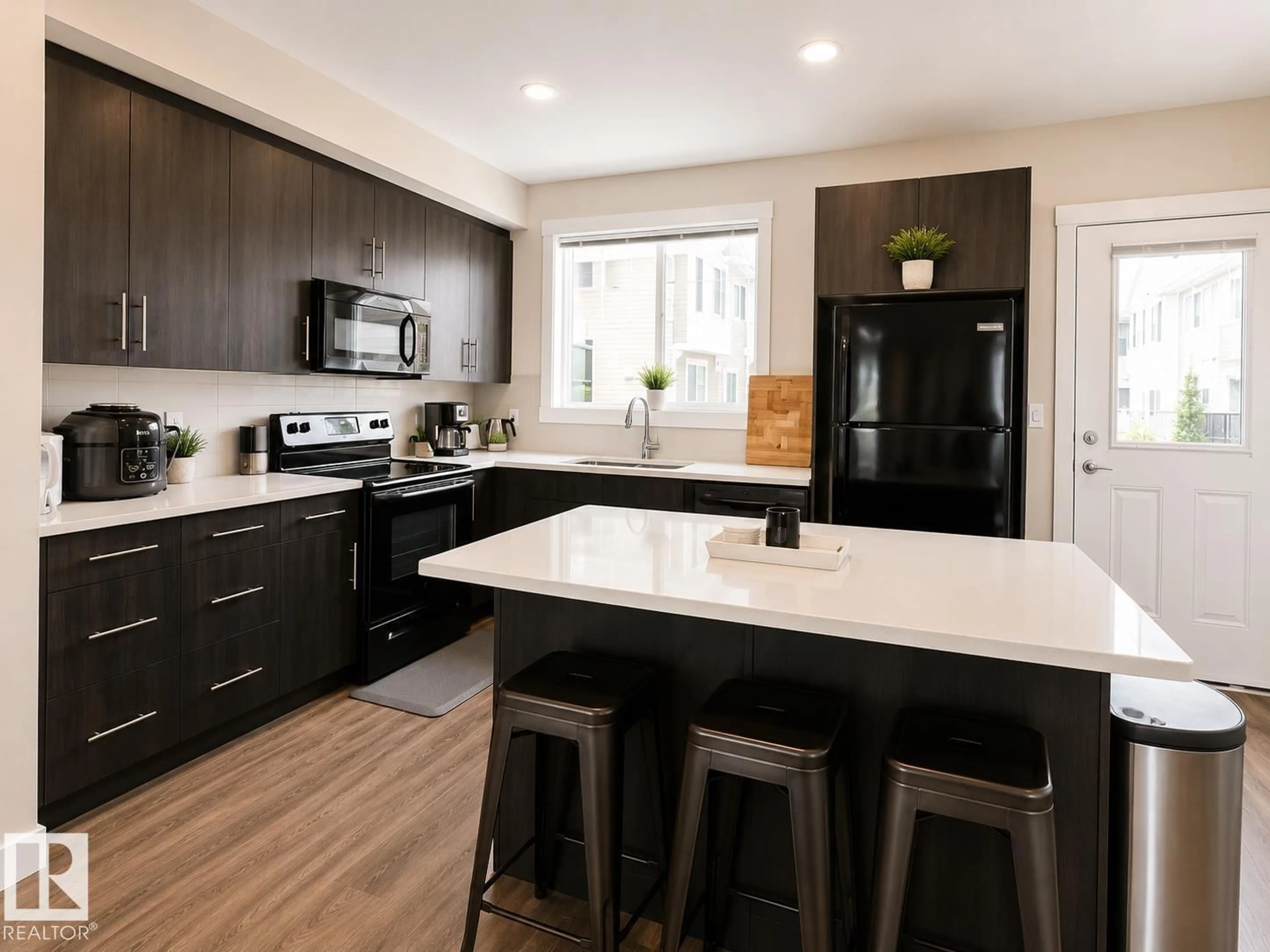 Open concept kitchen, unknown for #106 - 8530 94 ST, Fort Saskatchewan Alberta T8L0V8