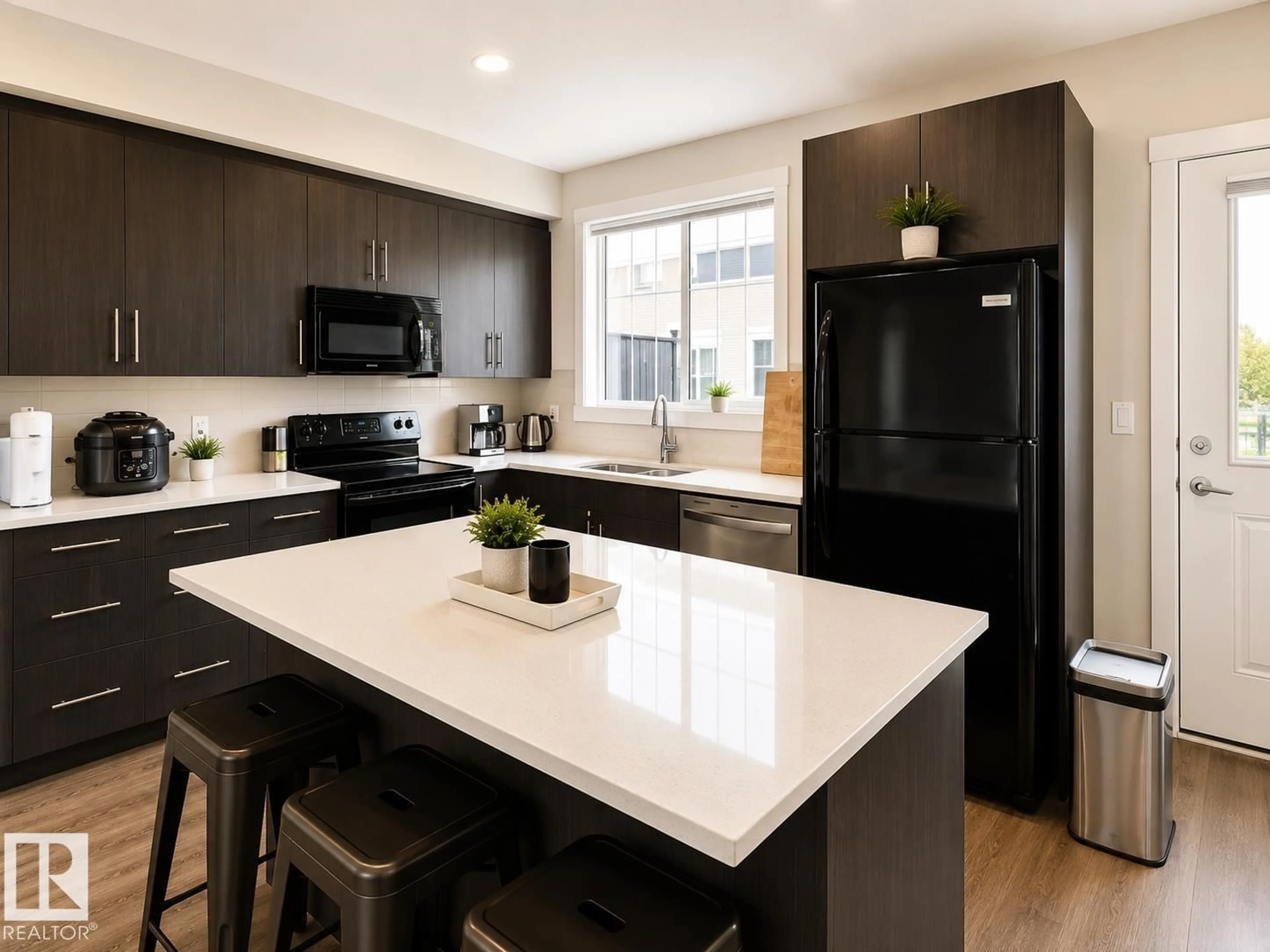 Open concept kitchen, unknown for #106 - 8530 94 ST, Fort Saskatchewan Alberta T8L0V8