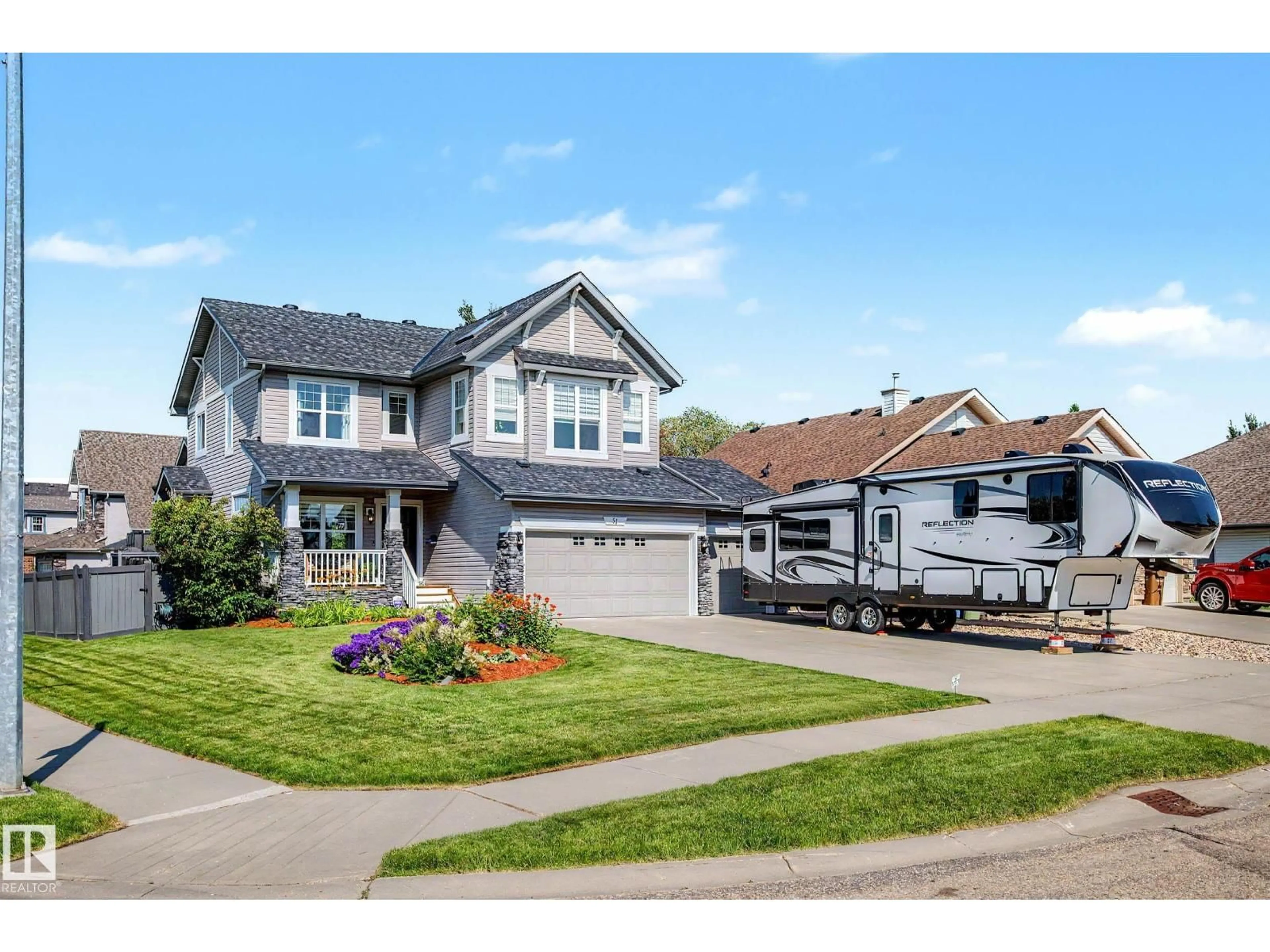Home with vinyl exterior material, street for 51 NICOLA RD, St. Albert Alberta T8N7M7