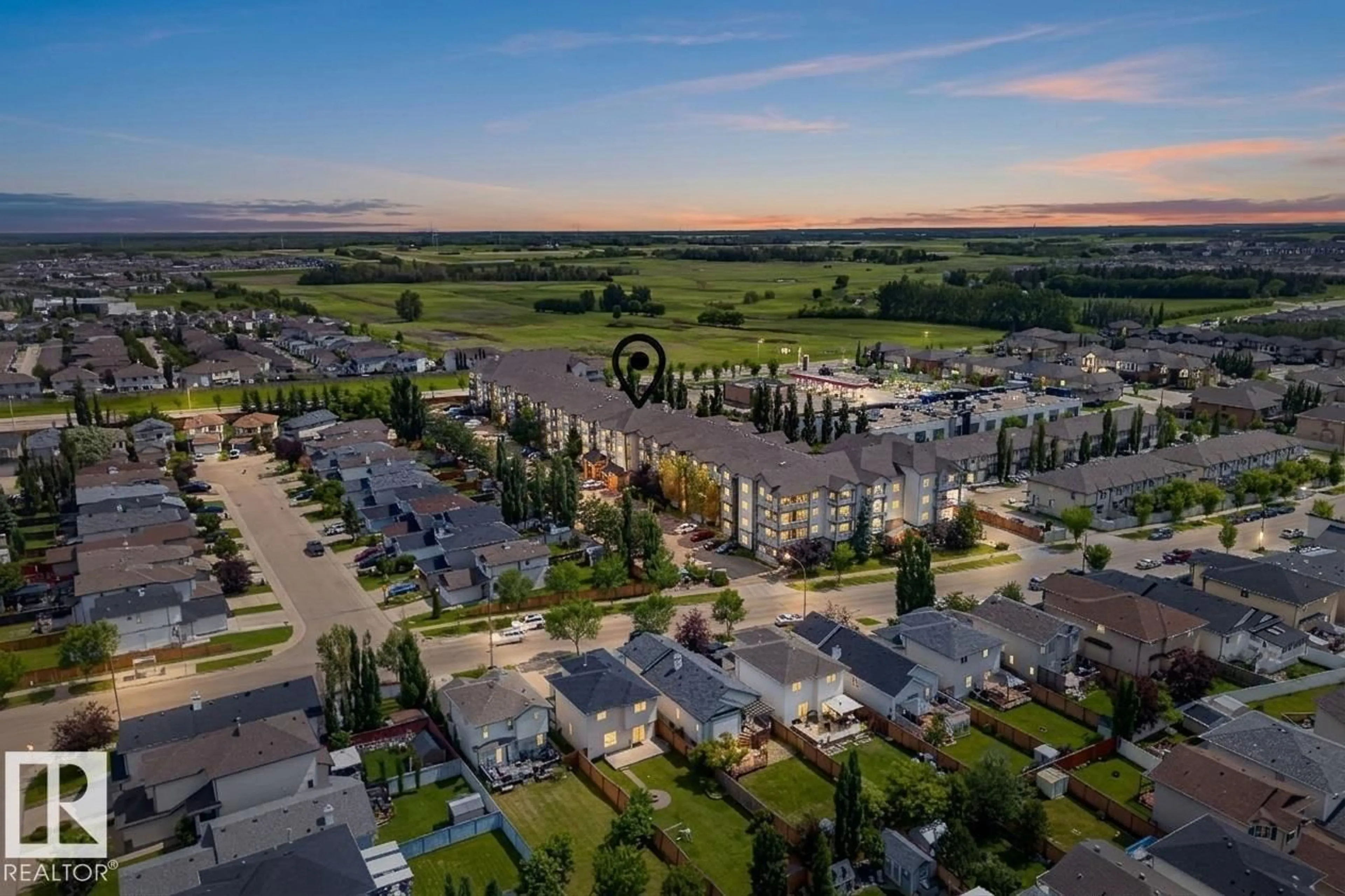 A pic from outside/outdoor area/front of a property/back of a property/a pic from drone, unknown for 430 - 3425 19 ST, Edmonton Alberta T6T2B5