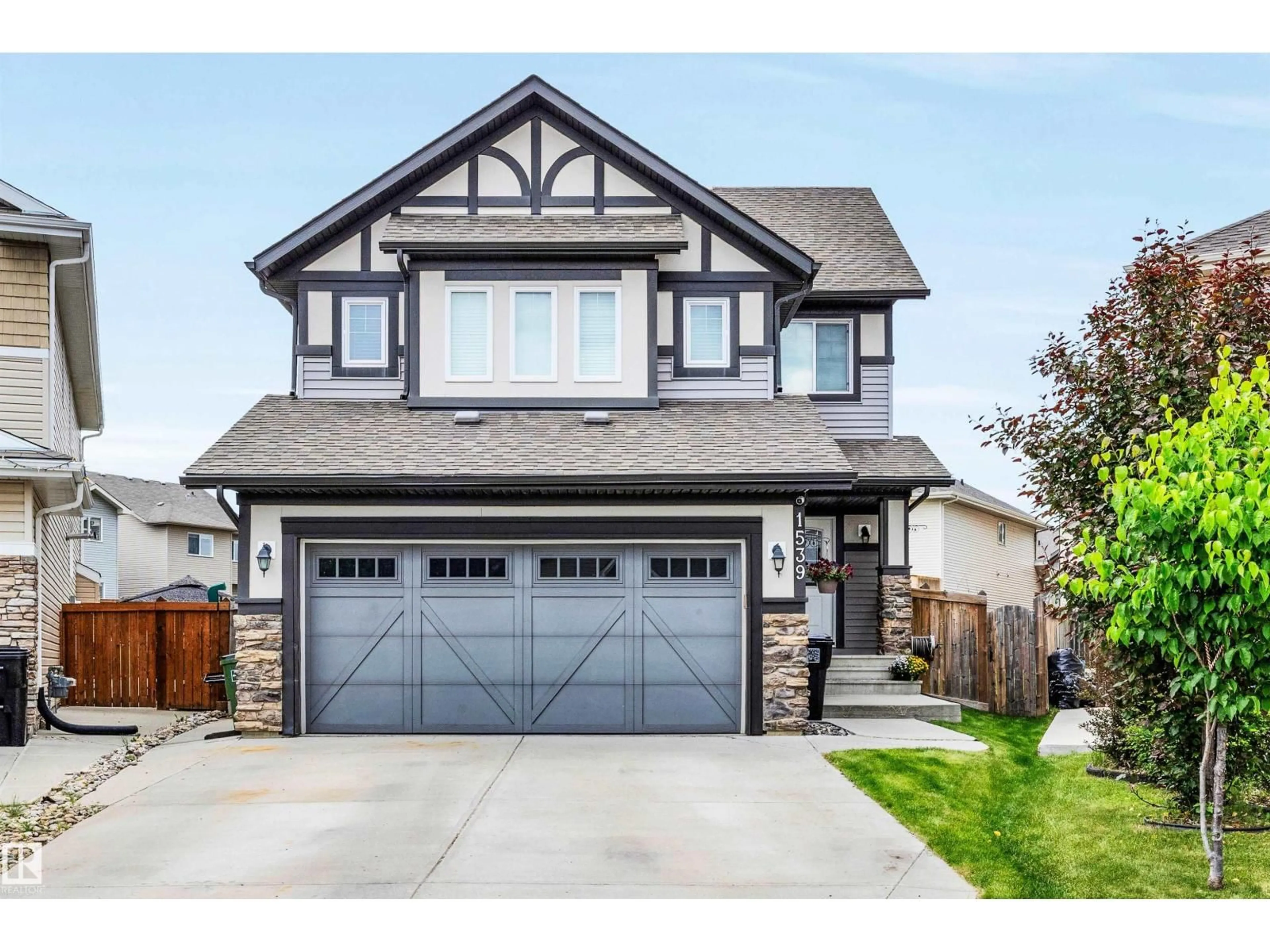 Home with vinyl exterior material, street for SW - 1539 CHAPMAN WY, Edmonton Alberta T6W0Z1