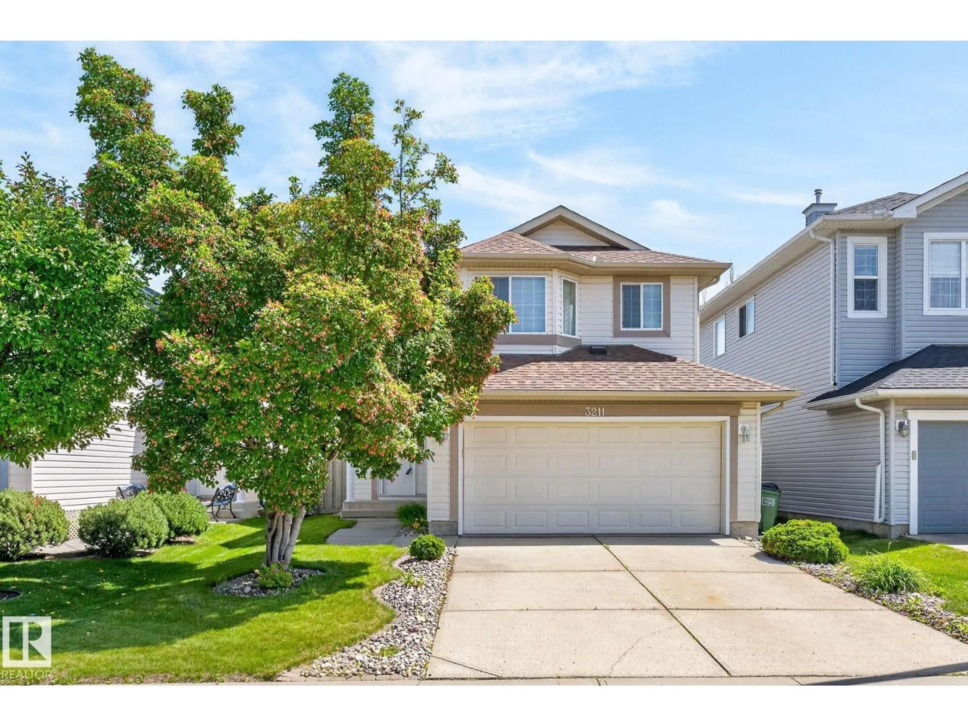 Home with vinyl exterior material, street for 3211 MCPHADDEN PL, Edmonton Alberta T6W1L1