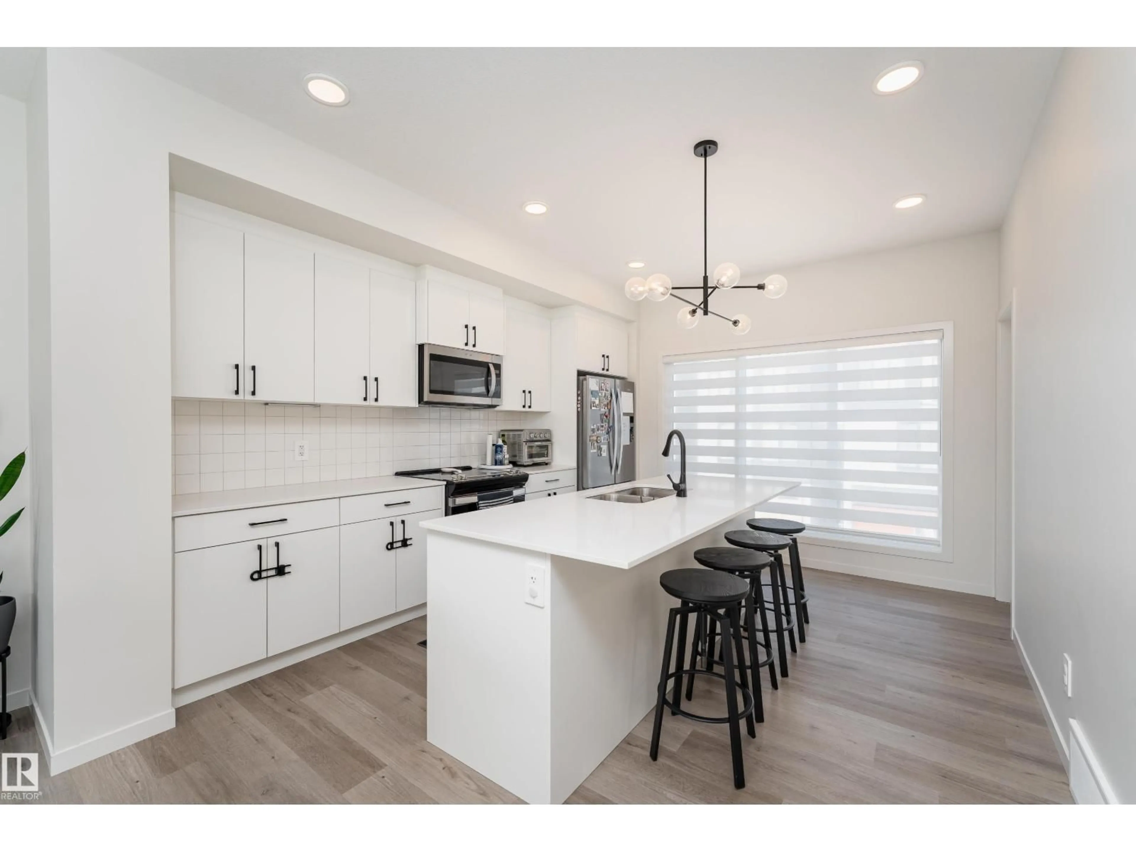 Open concept kitchen, unknown for 516 37 ST, Edmonton Alberta T6X3B2