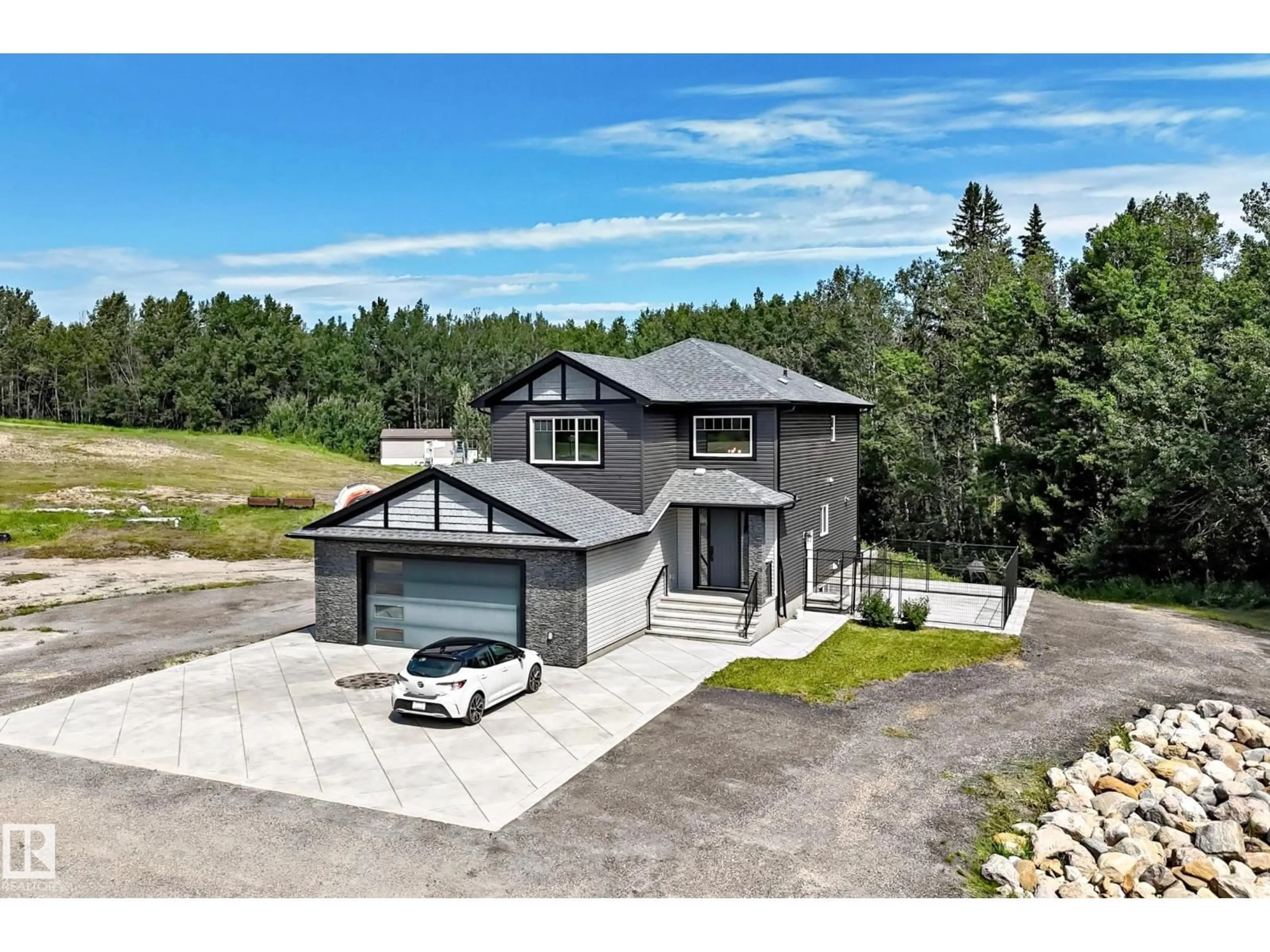 A pic from outside/outdoor area/front of a property/back of a property/a pic from drone, street for 1226 TWP ROAD 540, Rural Parkland County Alberta T7Y0H8