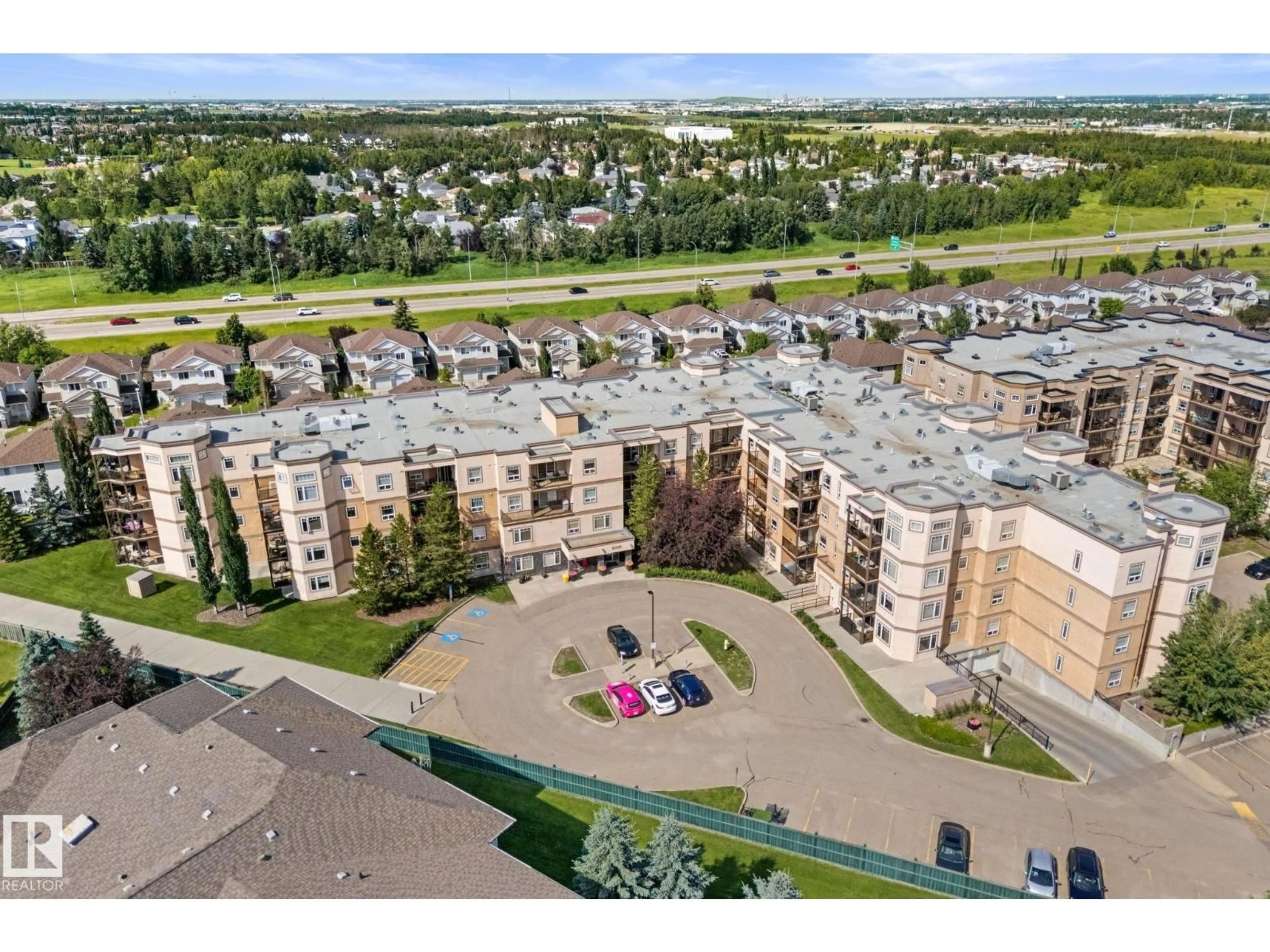 A pic from outside/outdoor area/front of a property/back of a property/a pic from drone, unknown for 419 - 2035 GRANTHAM CO, Edmonton Alberta T5T3X4