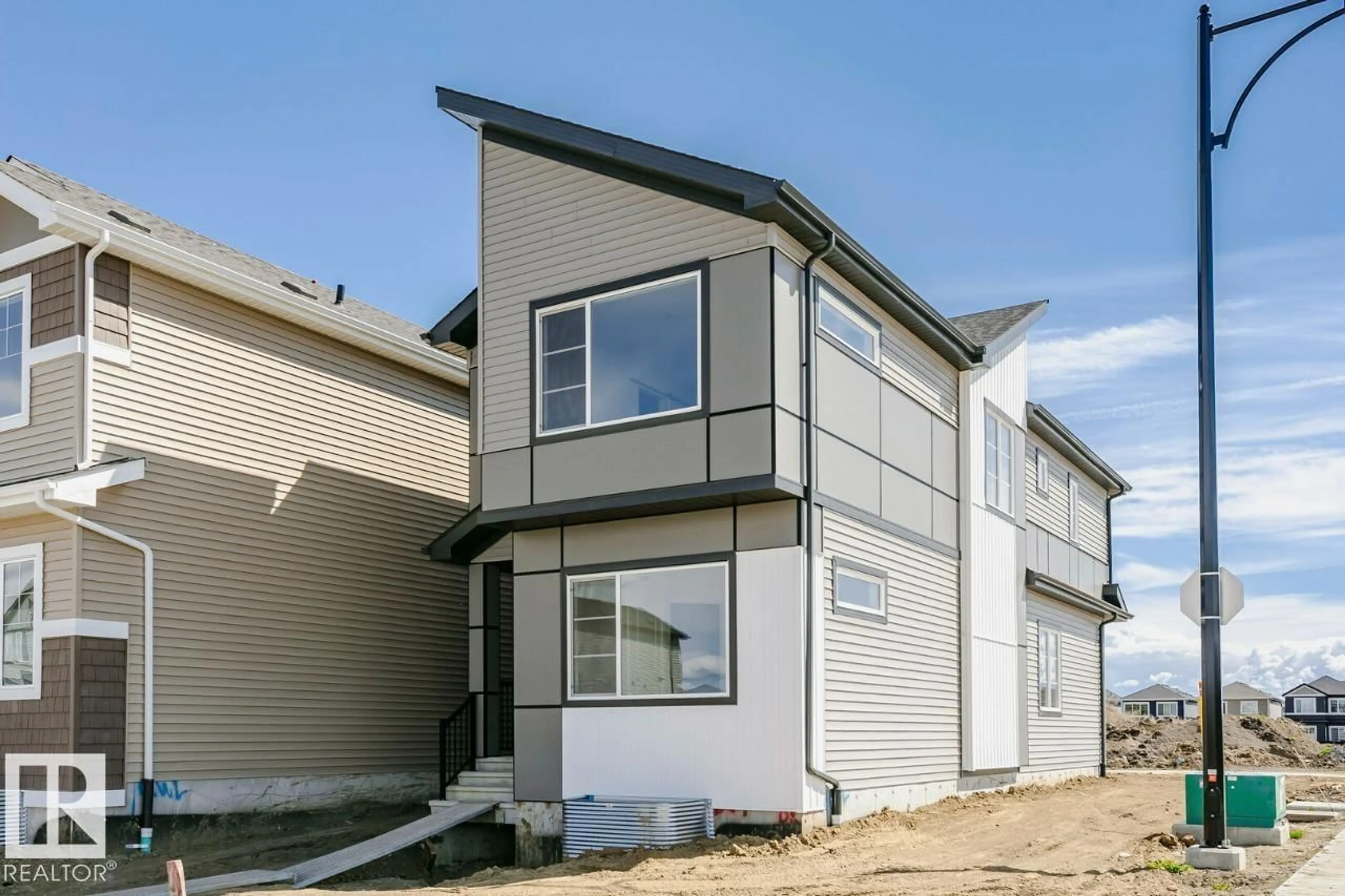 Home with vinyl exterior material, building for 303 EDGEMONT DR, Edmonton Alberta T6M3G7