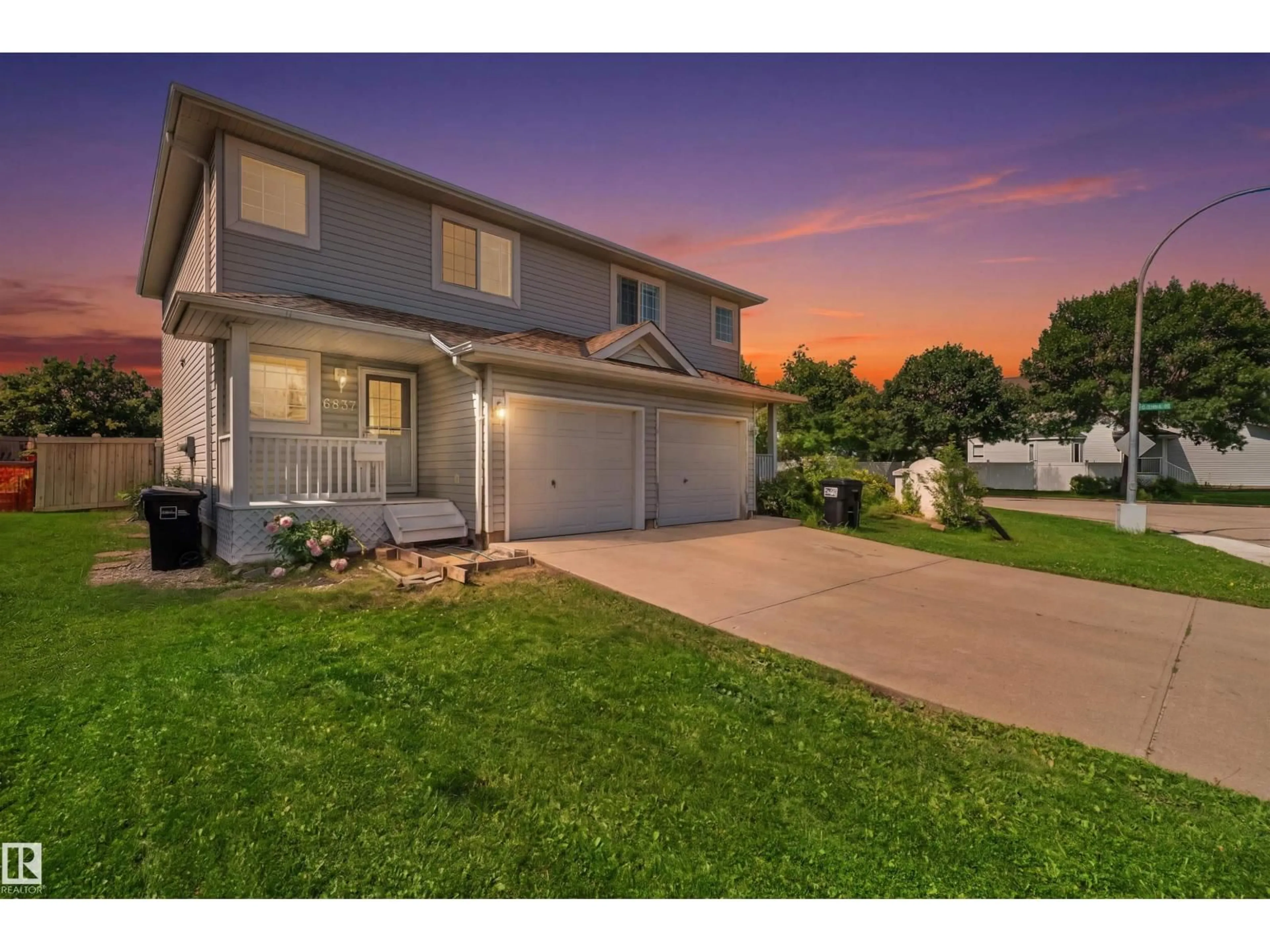 Home with vinyl exterior material, street for 6837 159A AV, Edmonton Alberta T5Z3N9