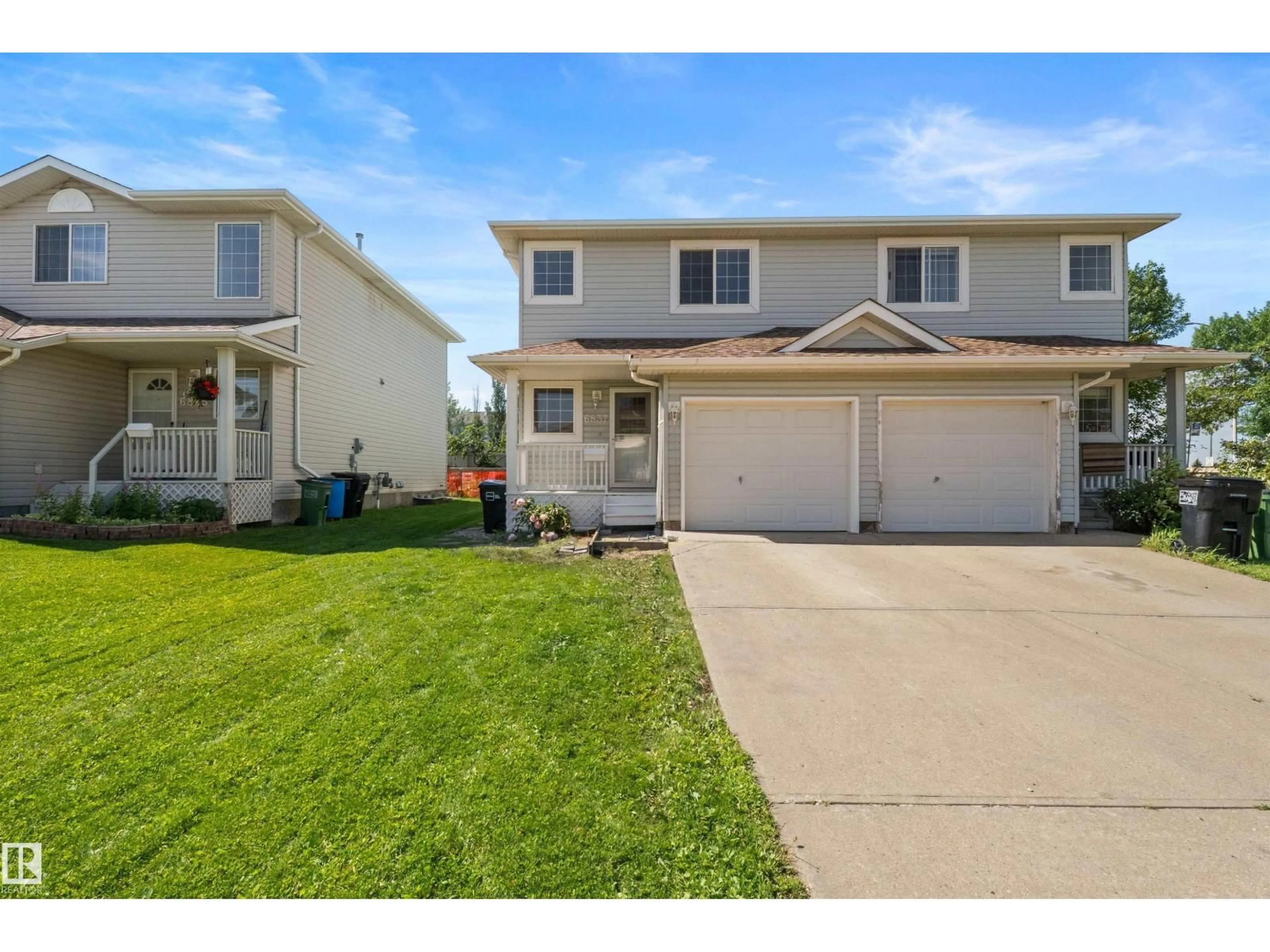 Home with vinyl exterior material, street for 6837 159A AV, Edmonton Alberta T5Z3N9