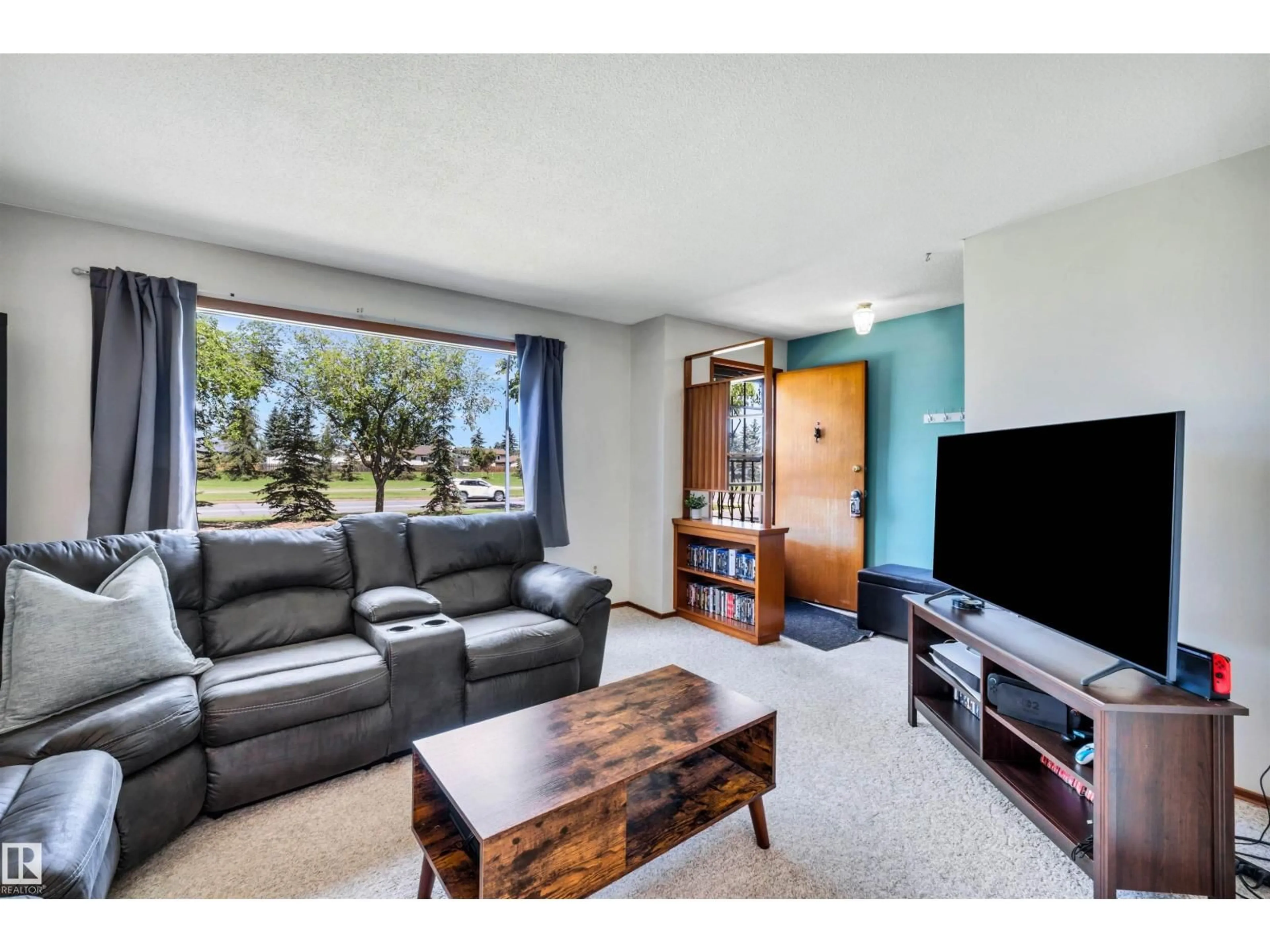 Living room with furniture, unknown for 11611 137 AV, Edmonton Alberta T5E1Z6