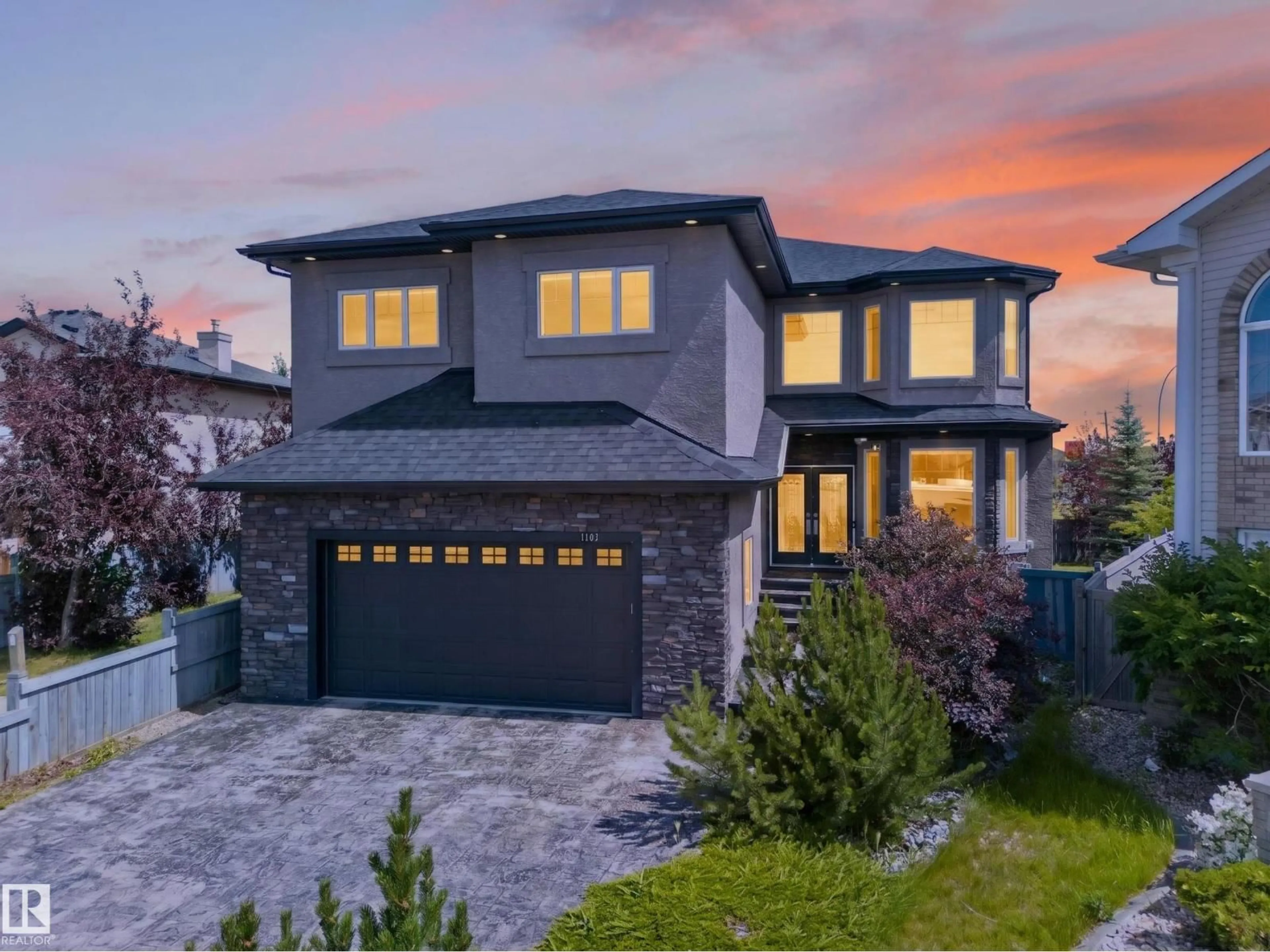 Home with brick exterior material, street for NW - 7103 168 AV, Edmonton Alberta T5Z0B5