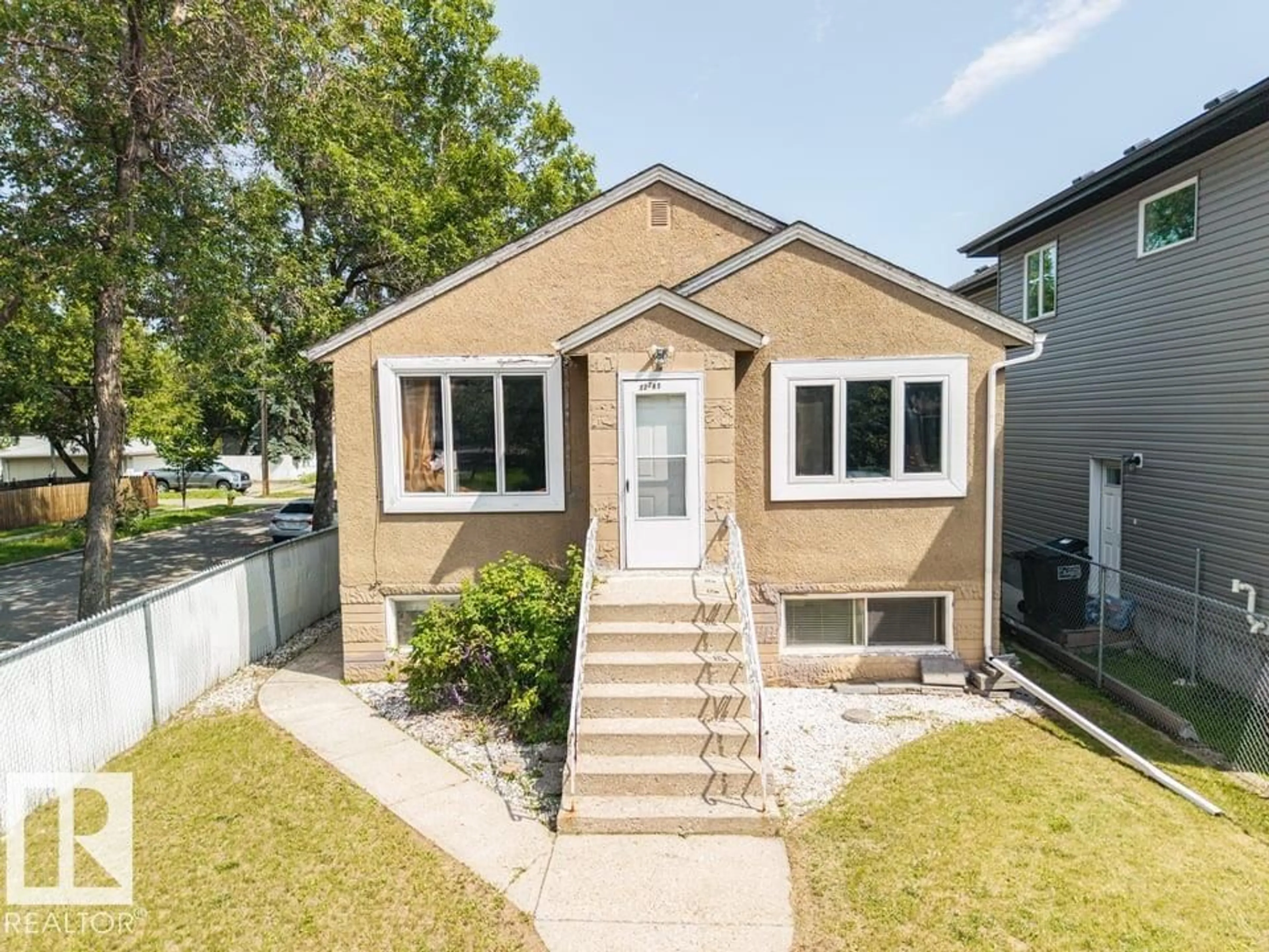 Home with vinyl exterior material, street for NW - 12347 90 ST, Edmonton Alberta T5B3Z6