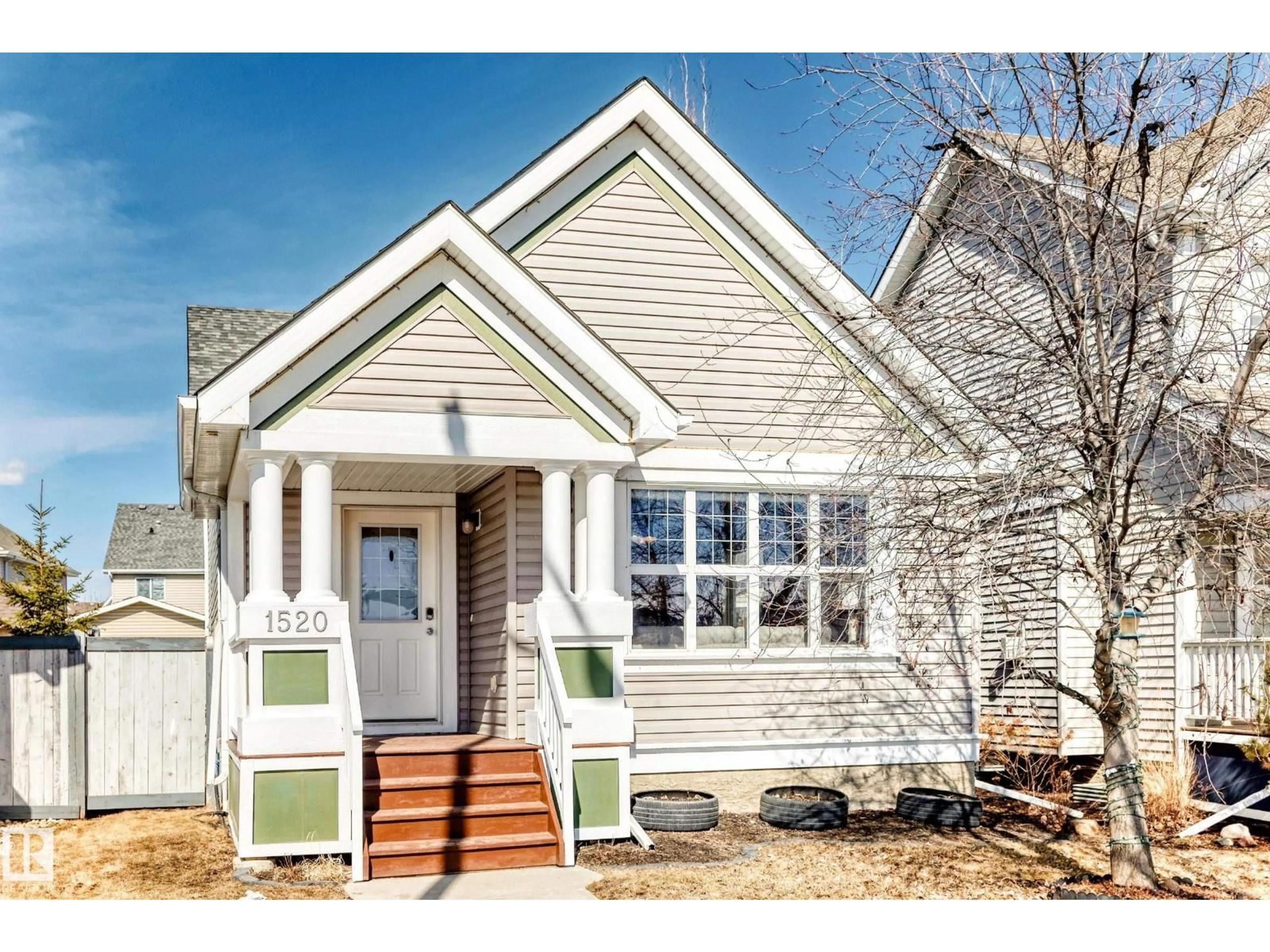 Home with vinyl exterior material, street for SW - 1520 70 ST, Edmonton Alberta T6X0H3