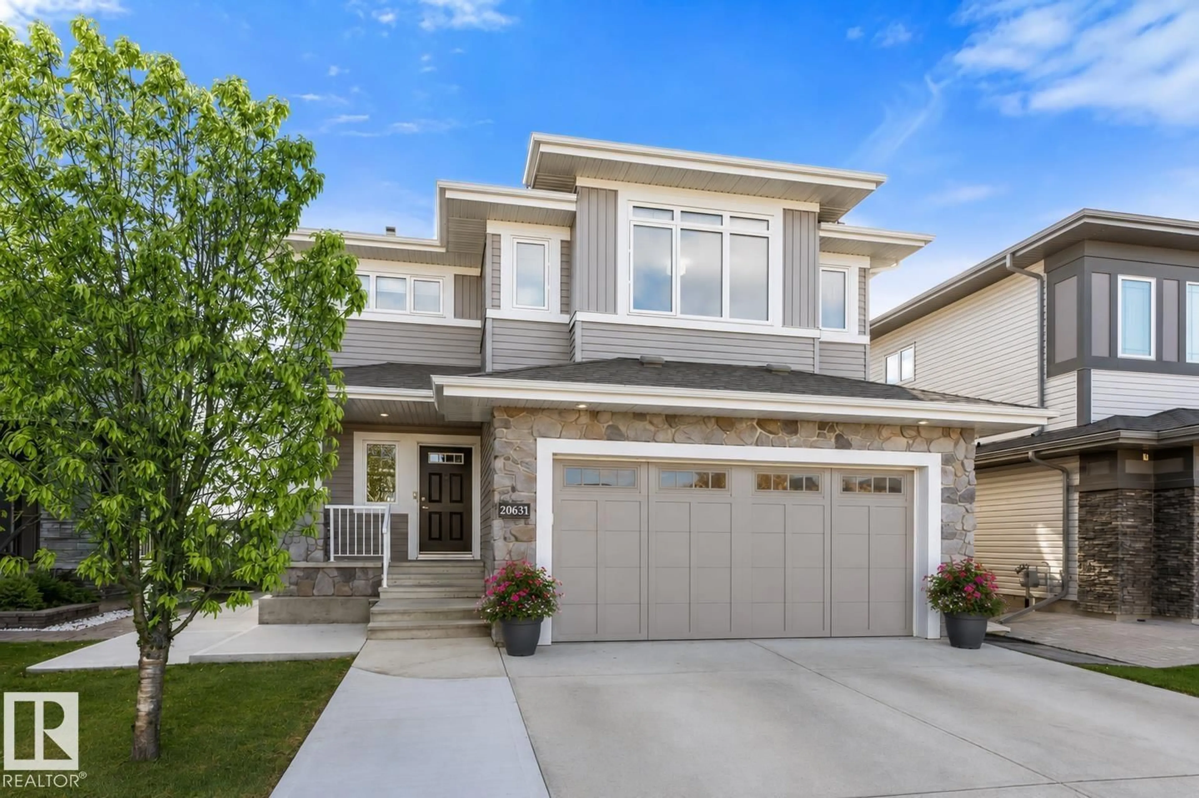 Home with vinyl exterior material, street for 20631 130 AV, Edmonton Alberta T5S0J4