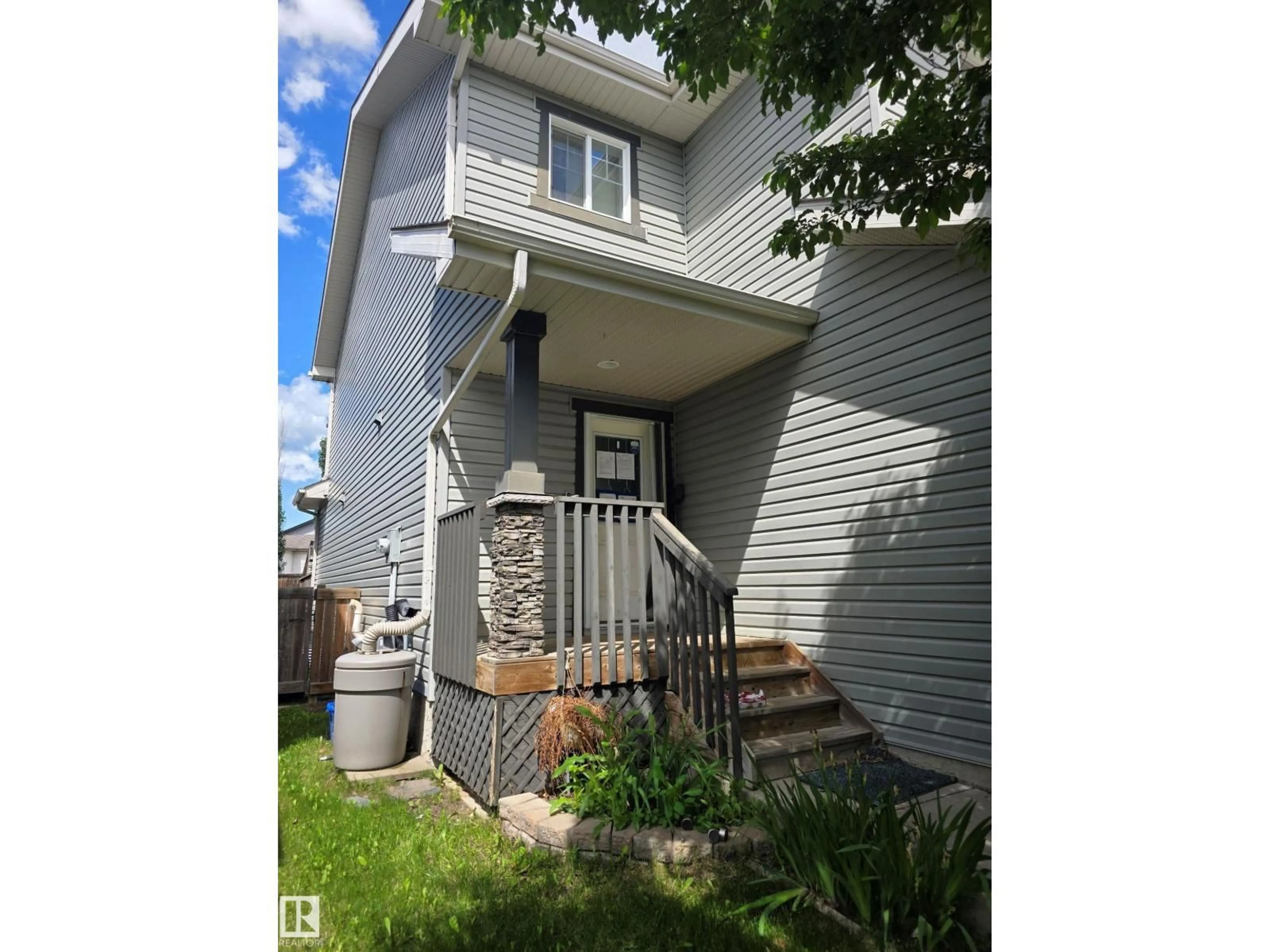 Home with vinyl exterior material, street for 4 SPRINGWOOD WY, Spruce Grove Alberta T7X1L4