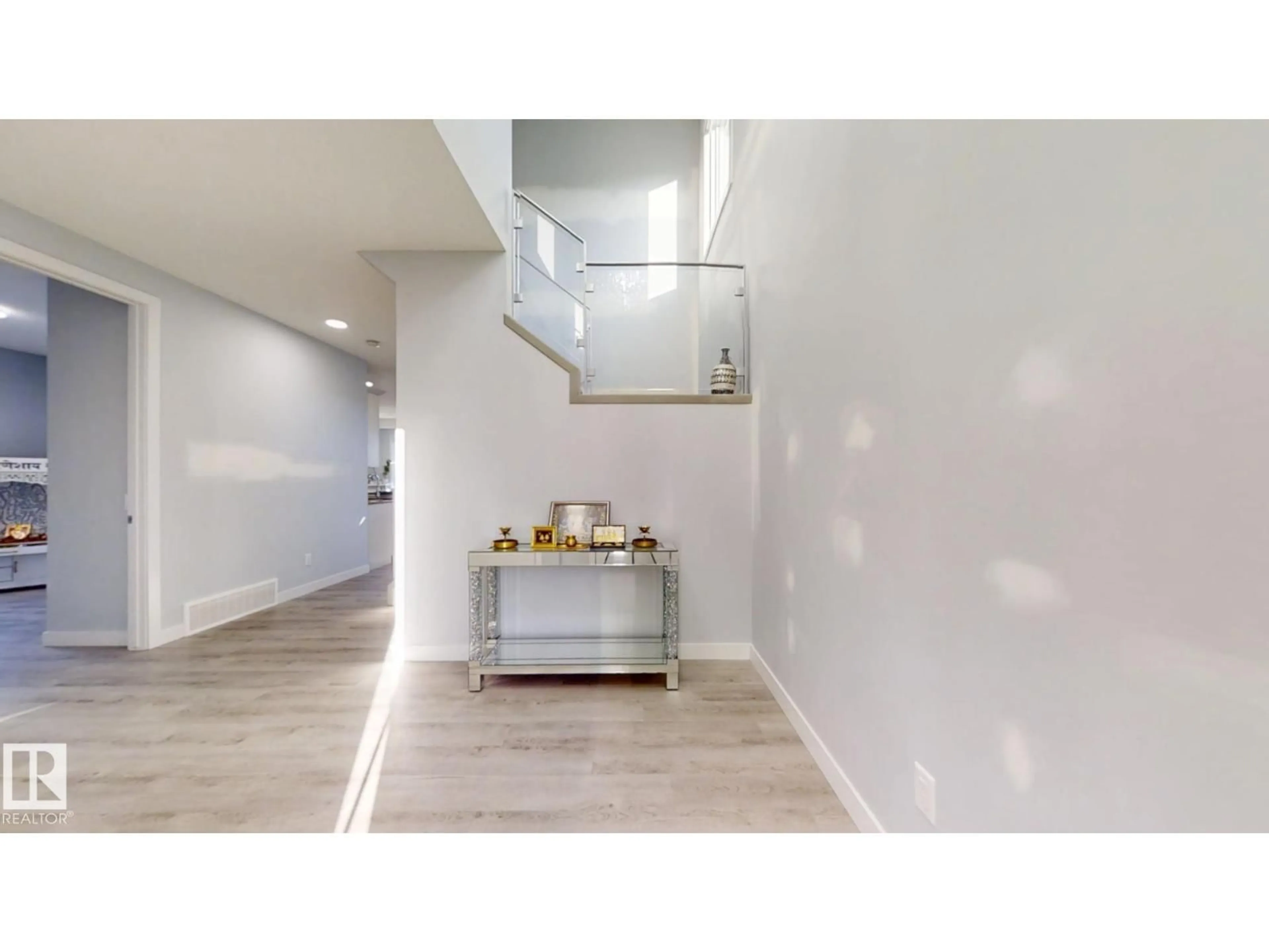 Indoor foyer for 215 GLENRIDDING RAVINE RD, Edmonton Alberta T6W5C2