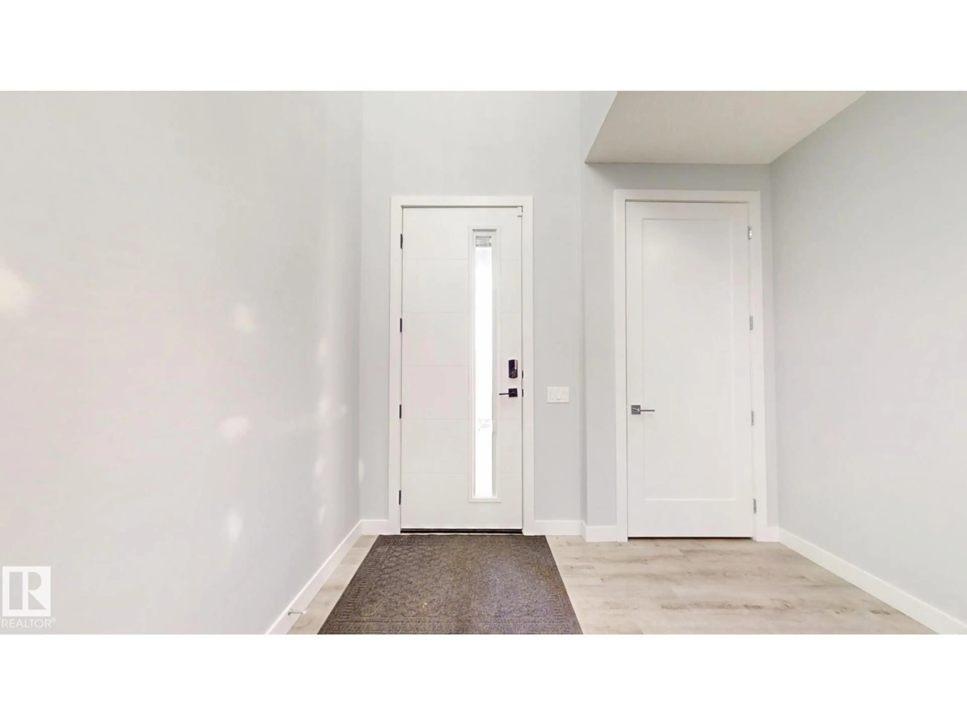 Indoor entryway for 215 GLENRIDDING RAVINE RD, Edmonton Alberta T6W5C2