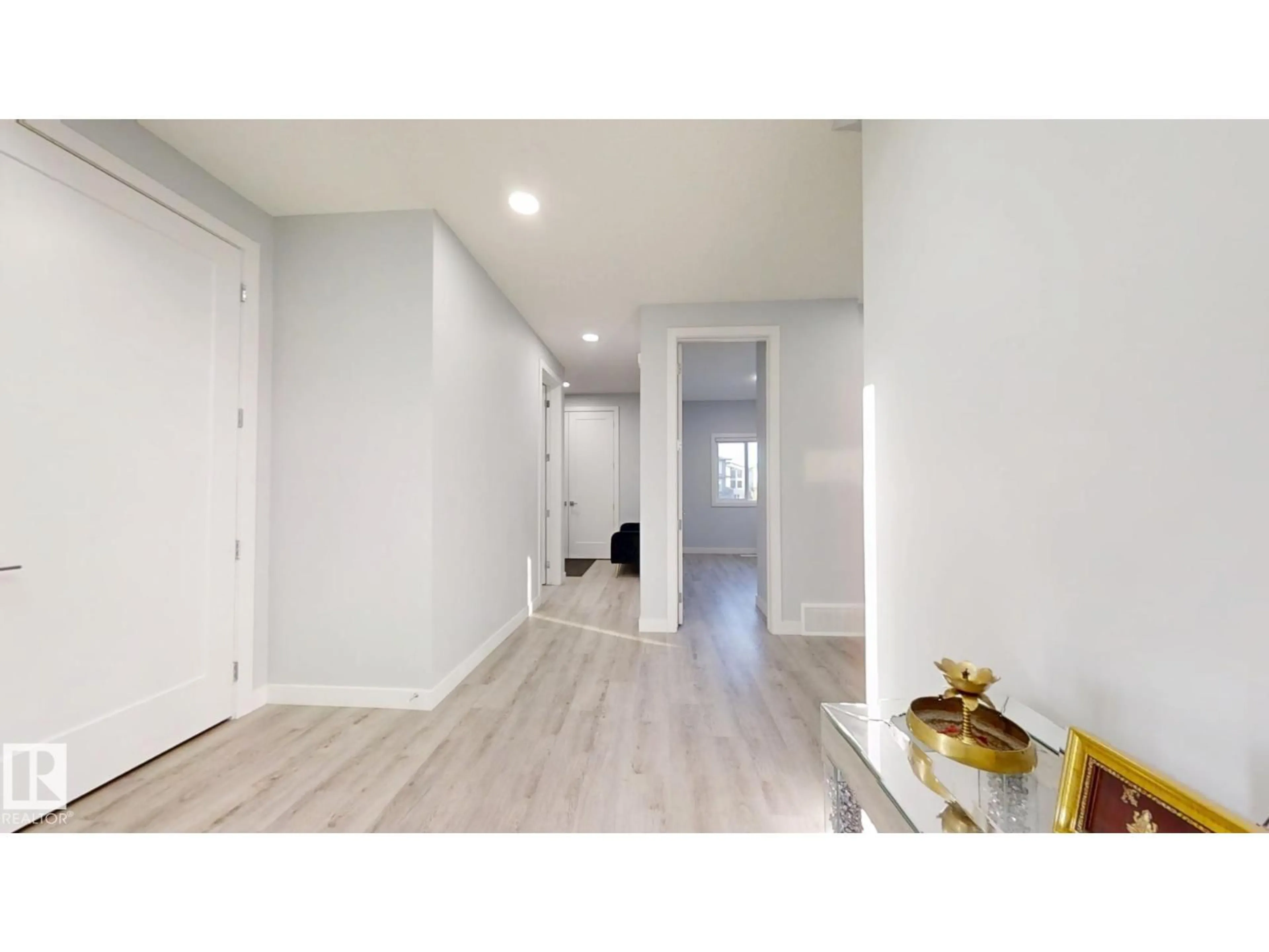 Indoor entryway for 215 GLENRIDDING RAVINE RD, Edmonton Alberta T6W5C2
