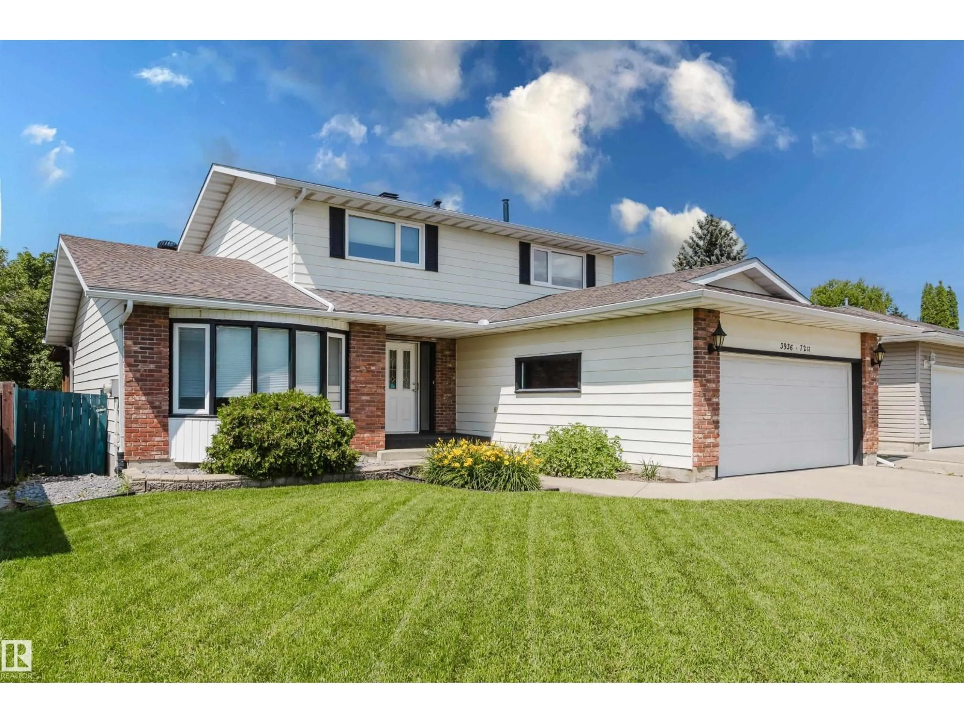 Home with vinyl exterior material, street for 3936 72 ST, Edmonton Alberta T6K0R8