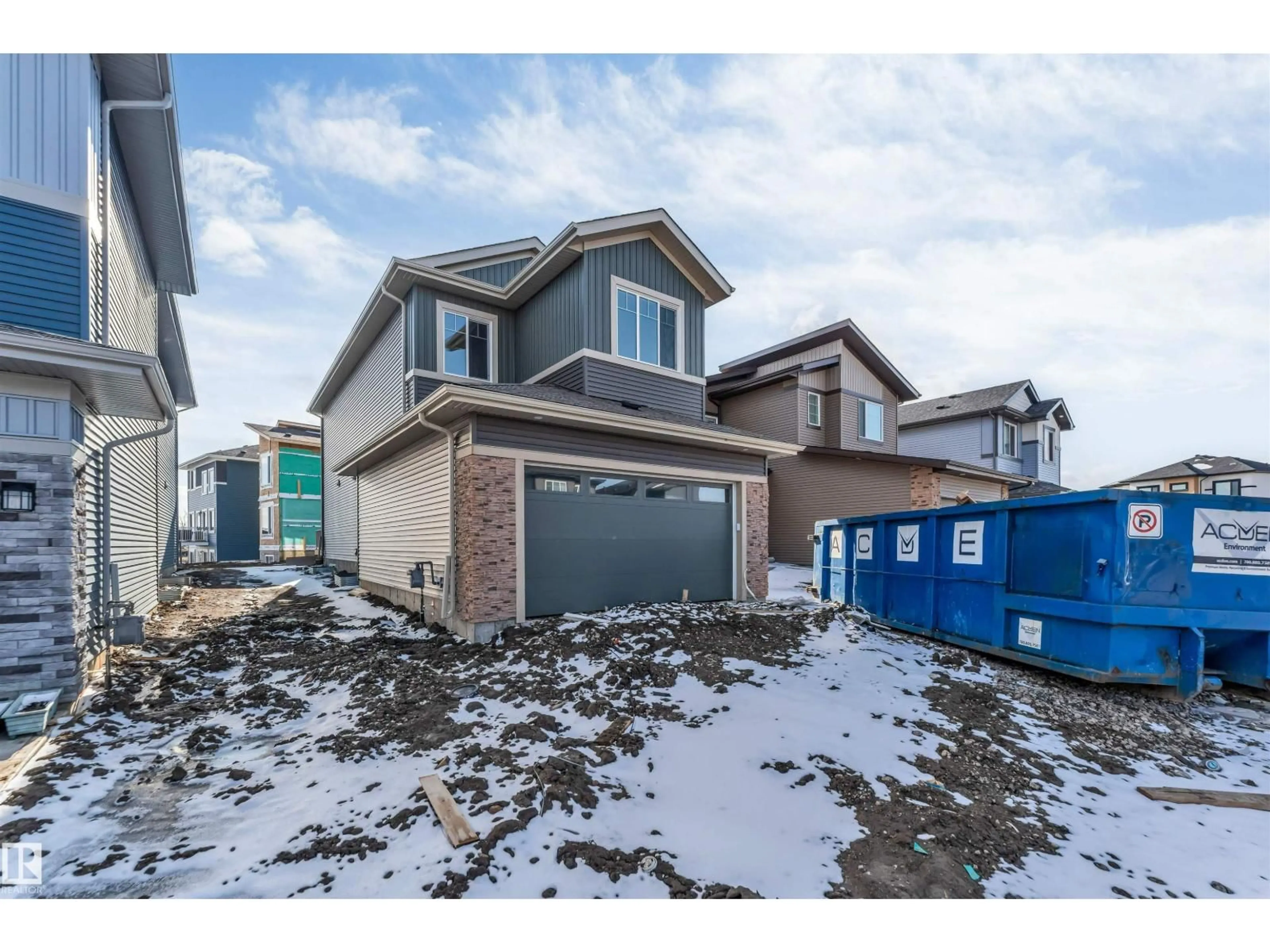 Home with vinyl exterior material, street for NE - 1739 60 AV, Rural Leduc County Alberta T4X3C8