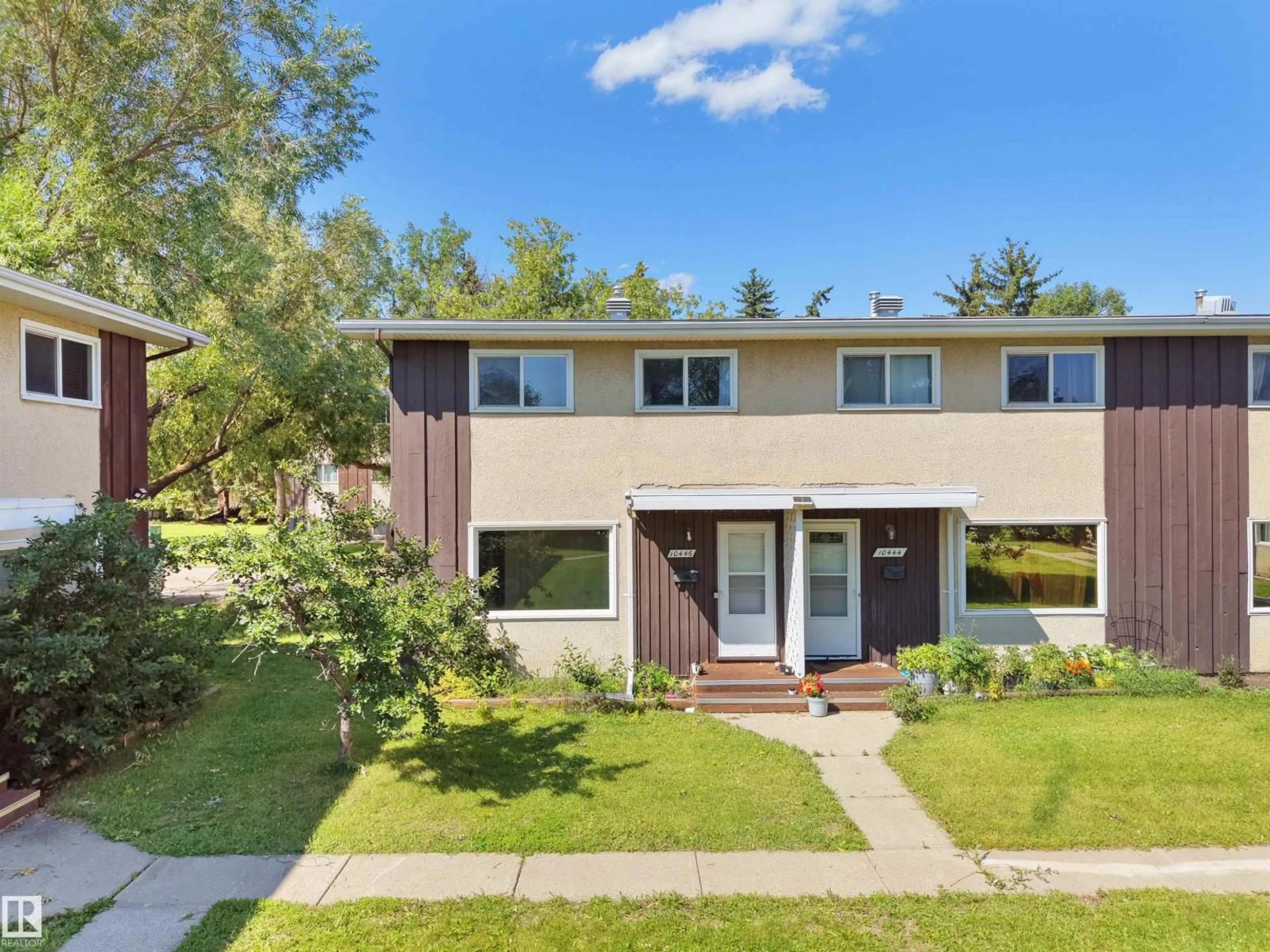 Home with vinyl exterior material, street for NW - 10446 55 AV, Edmonton Alberta T6H0W6