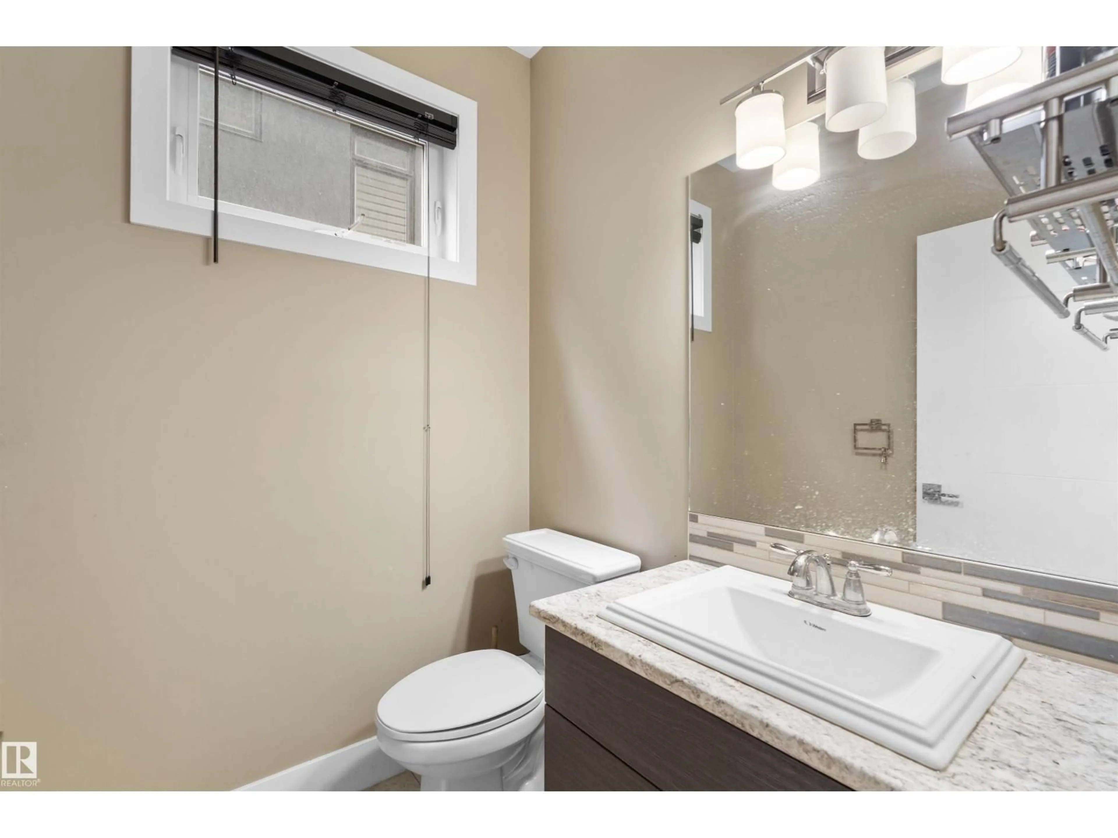Standard bathroom, ceramic/tile floor for 11719 127 ST, Edmonton Alberta T5M0V8