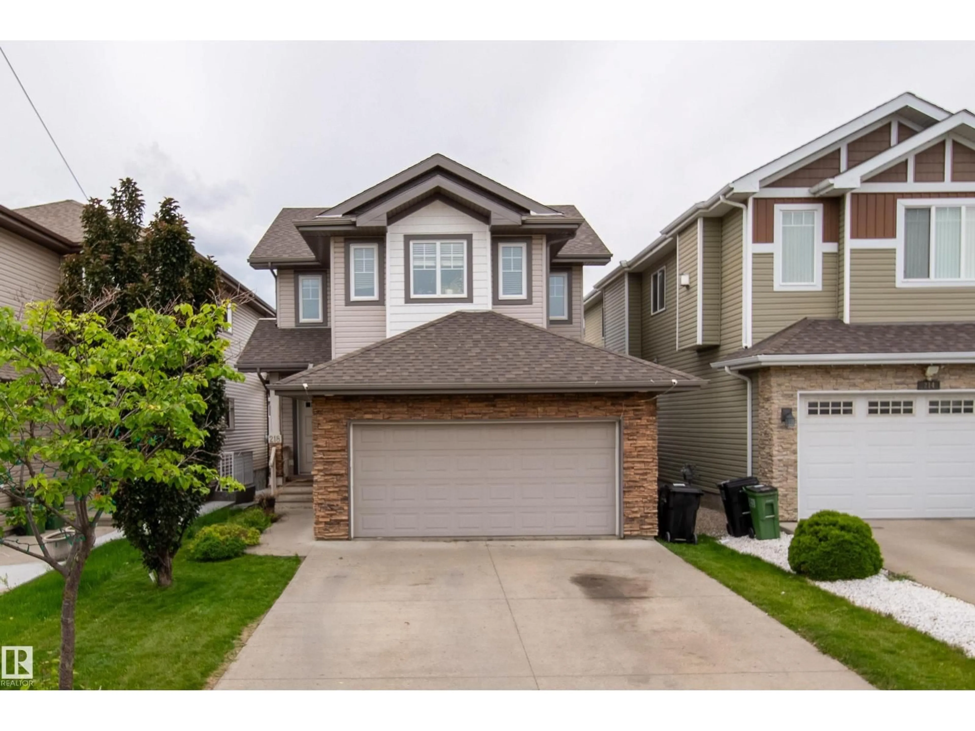 Home with vinyl exterior material, street for 218 51A ST, Edmonton Alberta T6X0R4