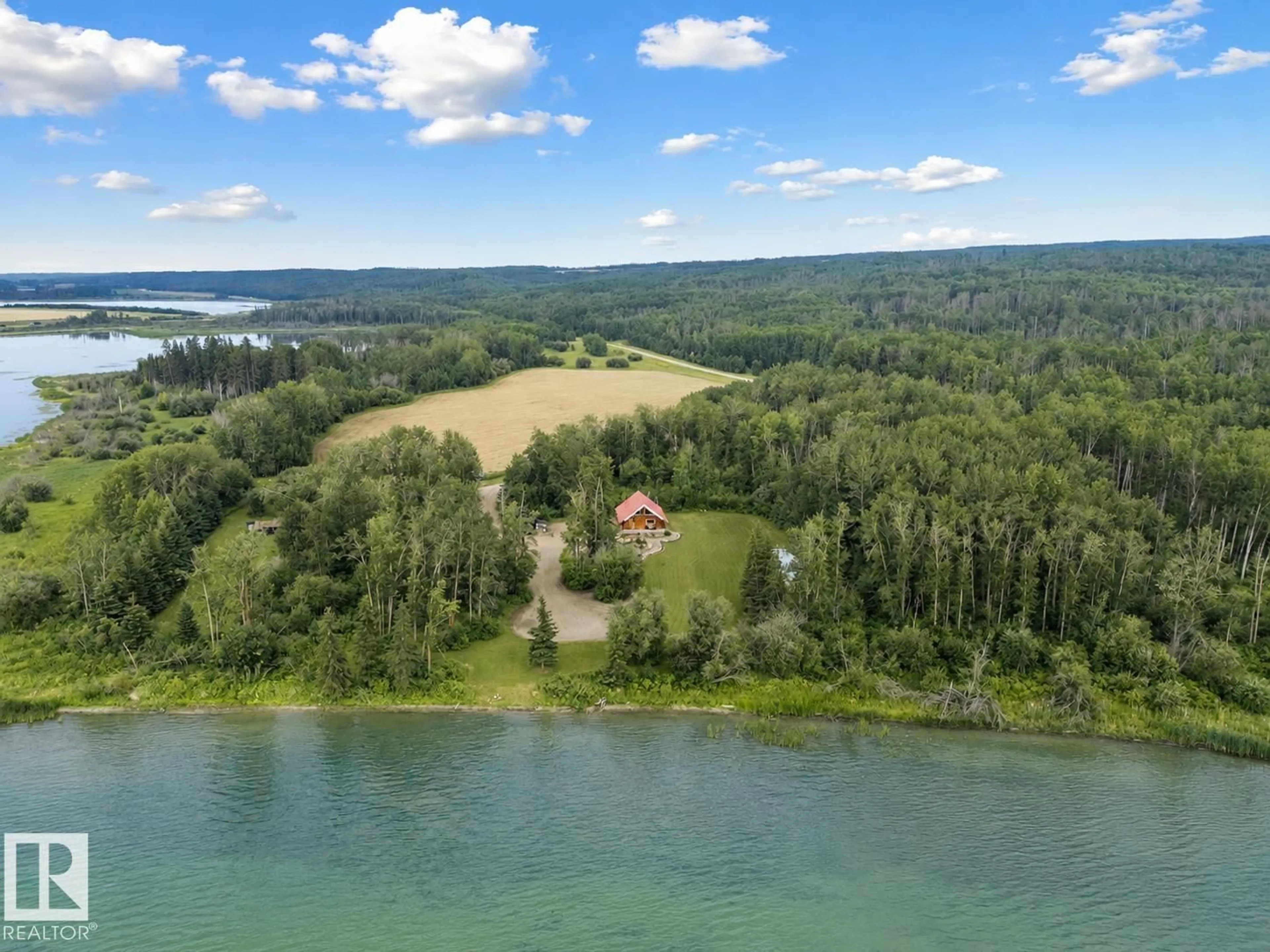 A pic from outside/outdoor area/front of a property/back of a property/a pic from drone, water/lake/river/ocean view for A - 58227 RANGE RD 70, Rural St. Paul County Alberta T0A0G1